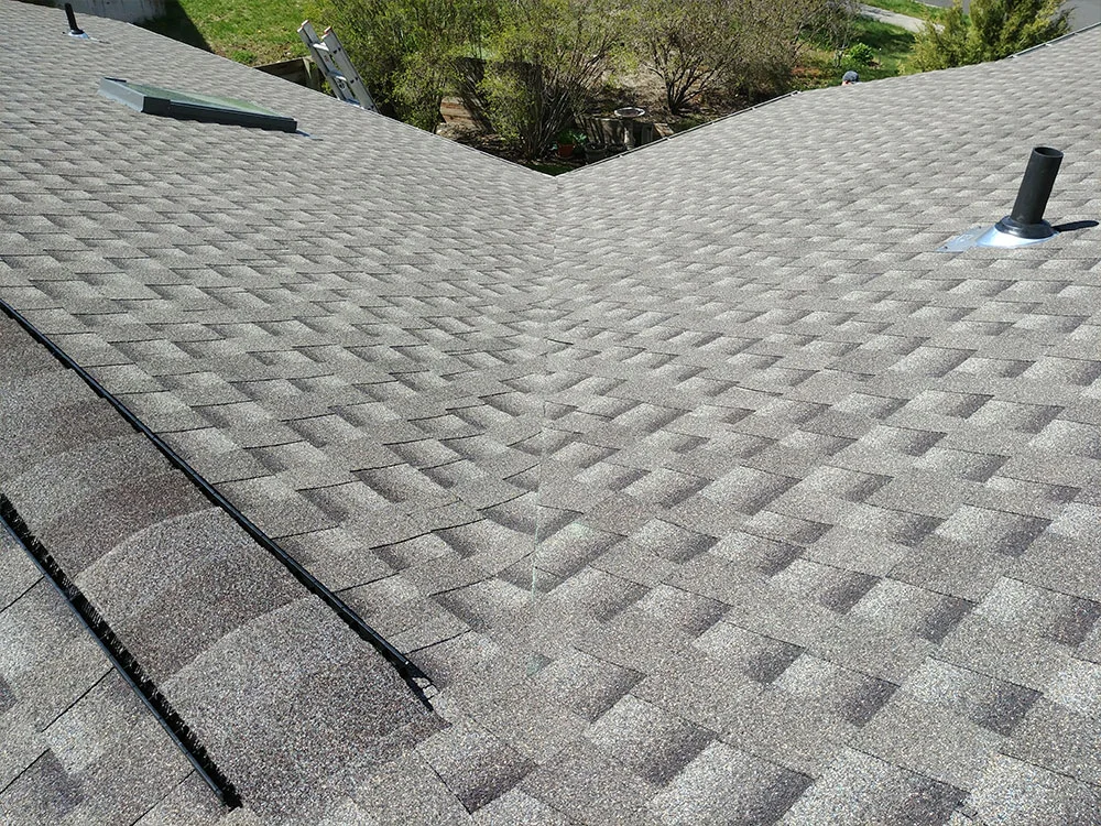 Above: The new valley and roof covered in architectural shingles.