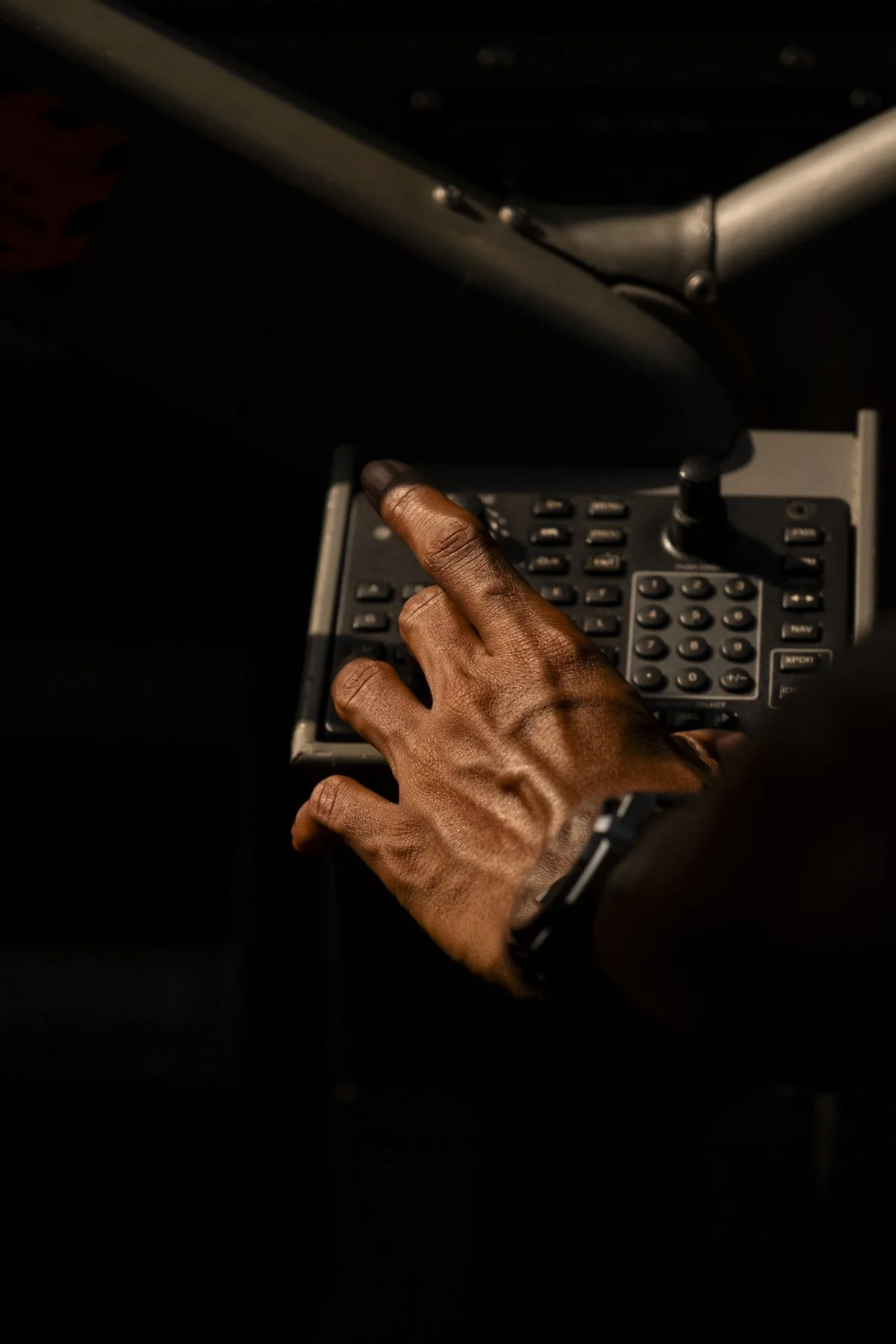 Pilot working controls of a seaplane in the cockpit