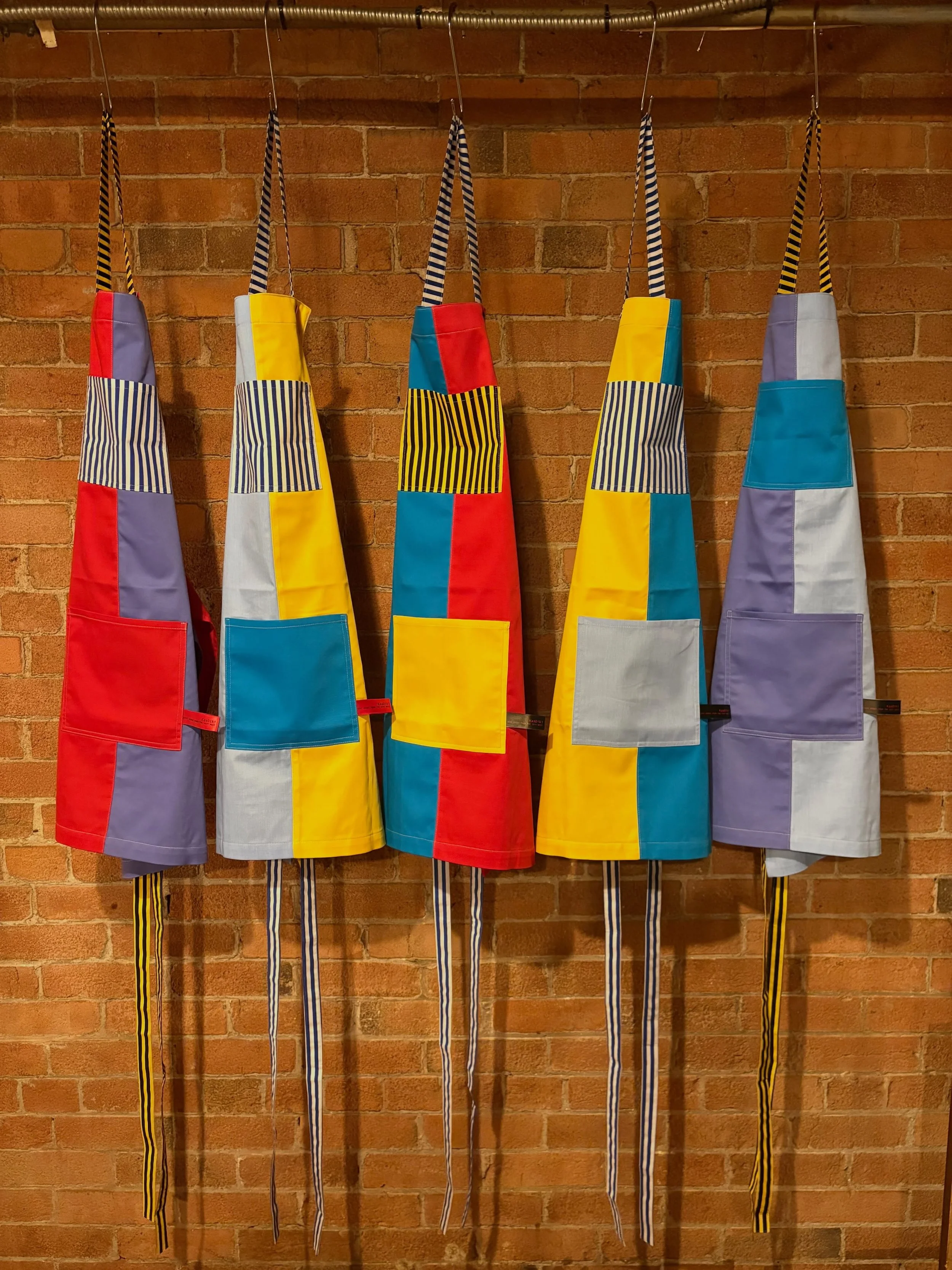 ✨ Fabulous new apron collection from @kaadiki 💙❤️💛. 

Bright and oh so beautiful! 

#yum #allthingculinary #yyc #designer #apron