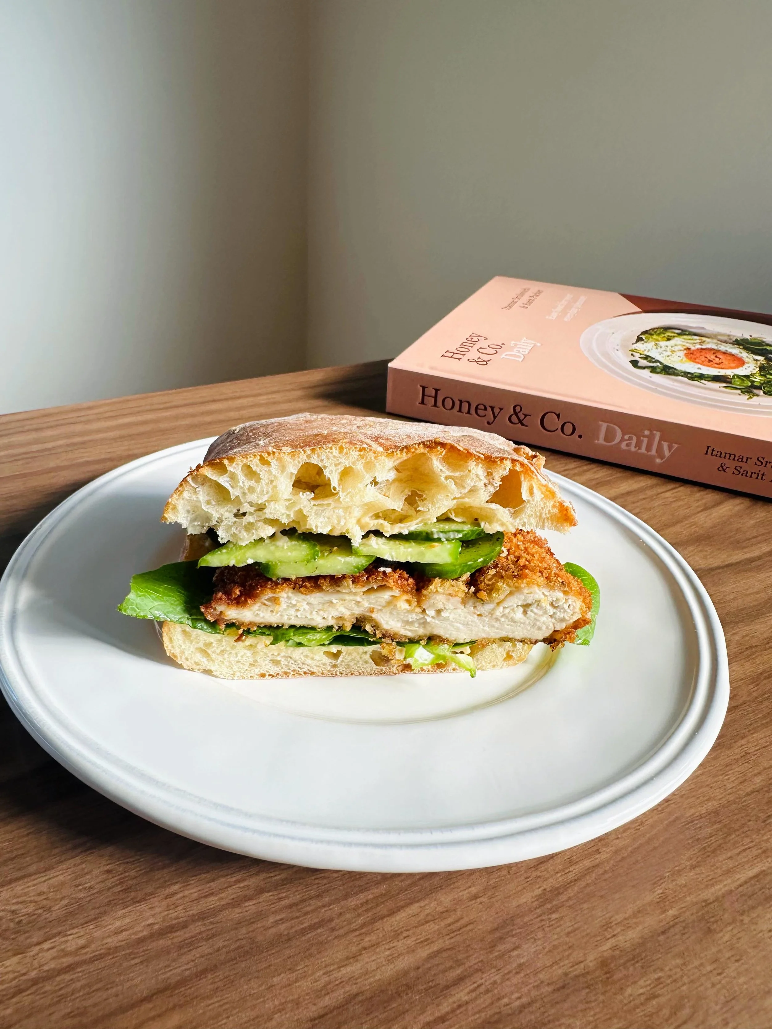 ✨ The Recipe of the Week is here! This week&rsquo;s feature recipe is joyful, summery, and delicious&mdash;a classic sandwich with a little pizazz from the new Honey &amp; Co. cookbook. Picnic season is upon us; pack up a few of these Crispy Za&rsquo