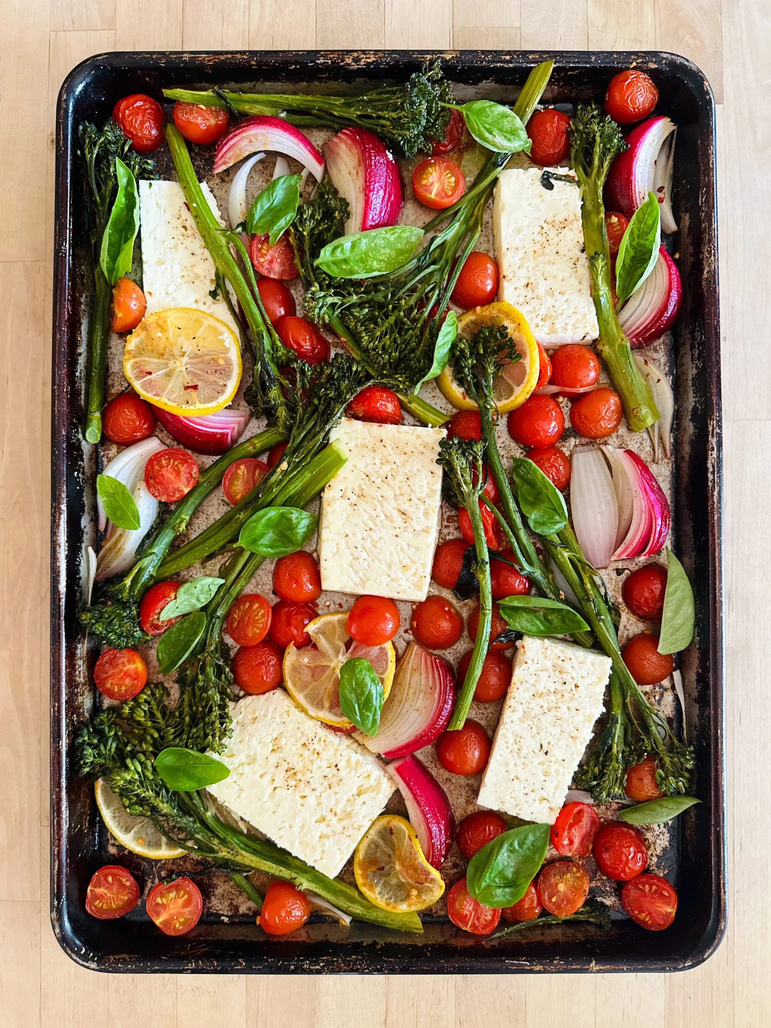 ✨The Recipe of the Week is easy to make, and takes full advantage of the gorgeous cherry tomatoes and fresh herbs available right now. Behold the bright and beautiful Baked Feta with Broccolini, Tomatoes, and Lemon. Yum!

For the recipe, along with m