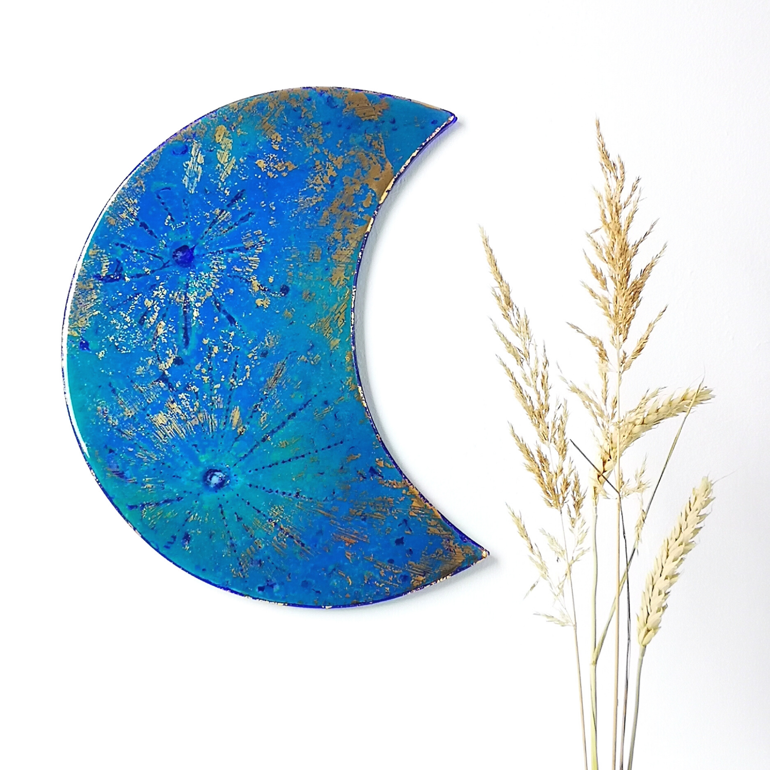  A set of three waning moons with gold lustre detailing.  
