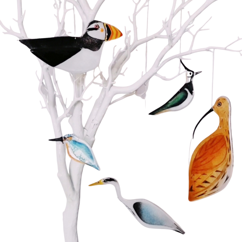 A delicately crafted fused glass Lapwing to enhance any space in