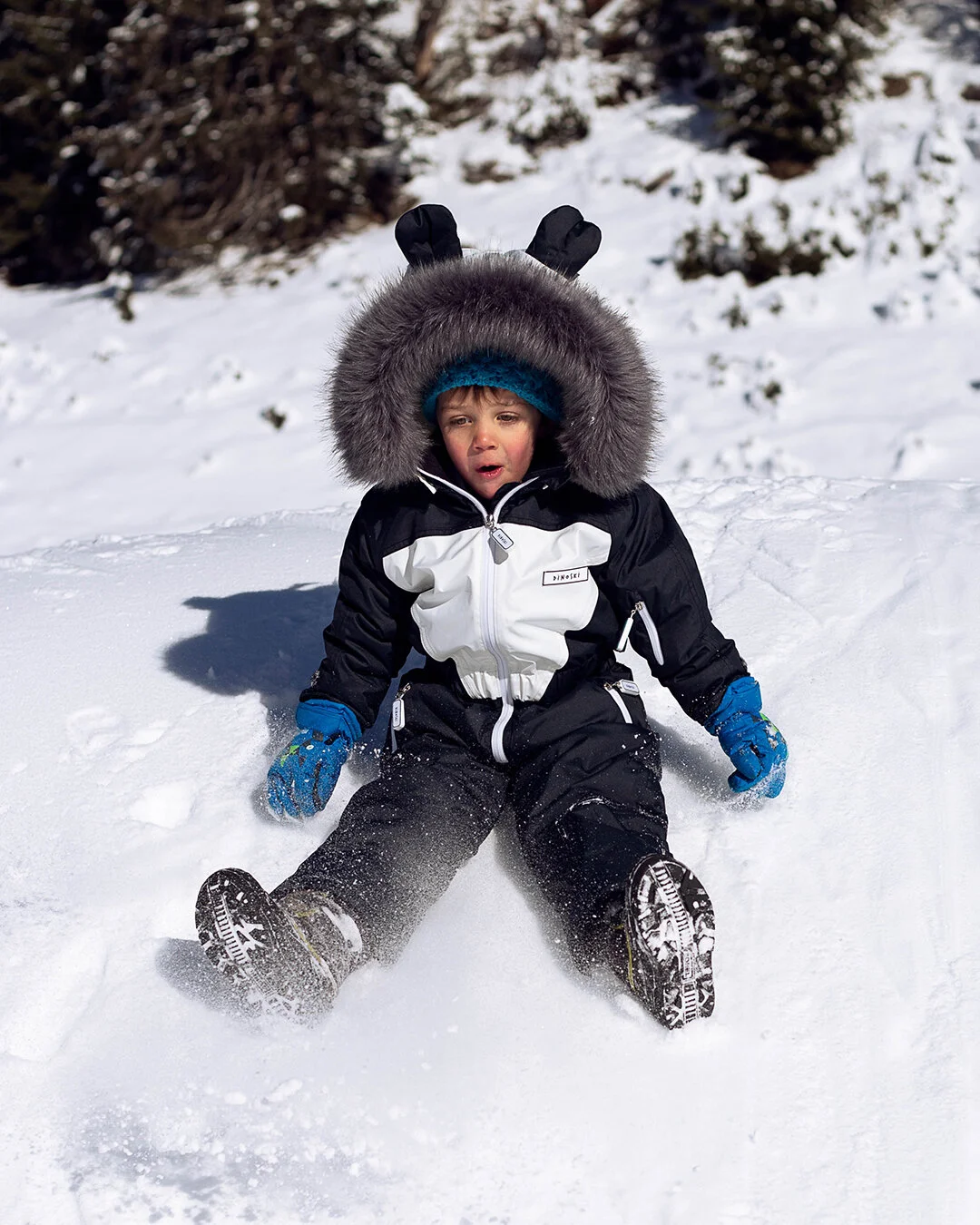 Having your child playing in the snow from as early as possible will help them associate fun with snow!