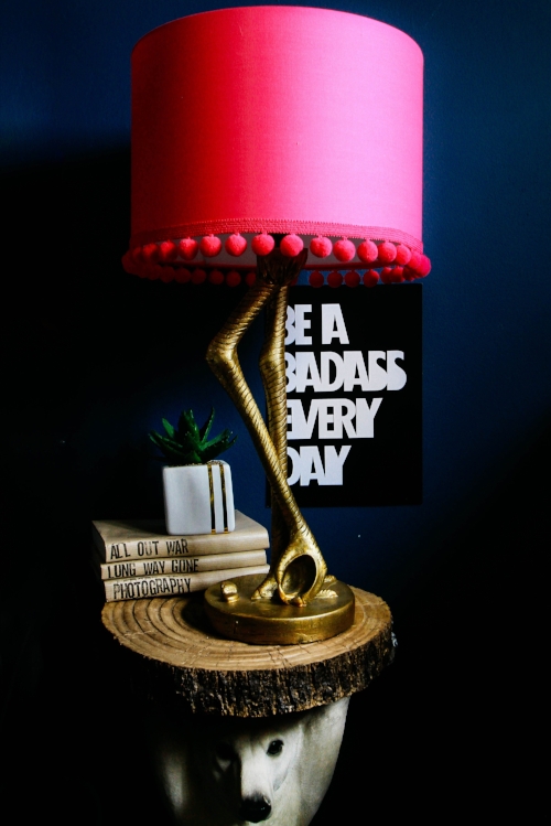 Beautiful Love Frankie Flamingo Lamp in antique gold with hot pink lampshade that i killed by adding uneven pom pom trim