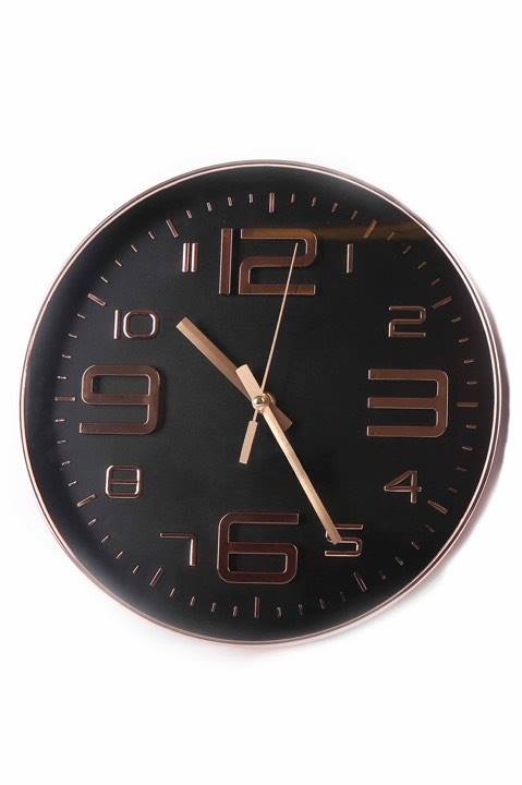 Rose gold and black embossed wall clock - picture courtesy of Bhs