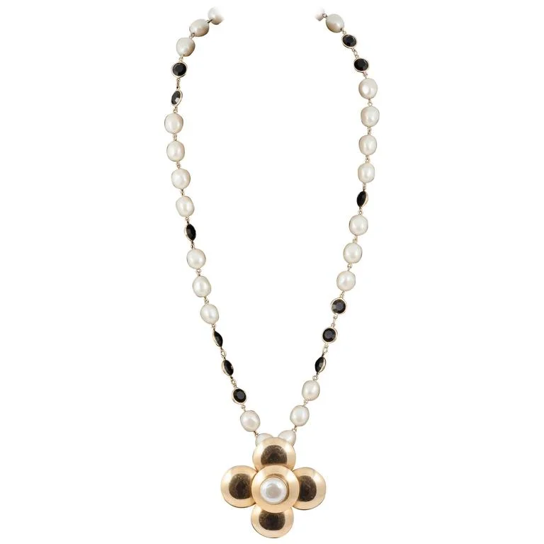 Joyous Yves Saint Laurent 'daisy' pearl,gilt and black glass pendant, 1980s