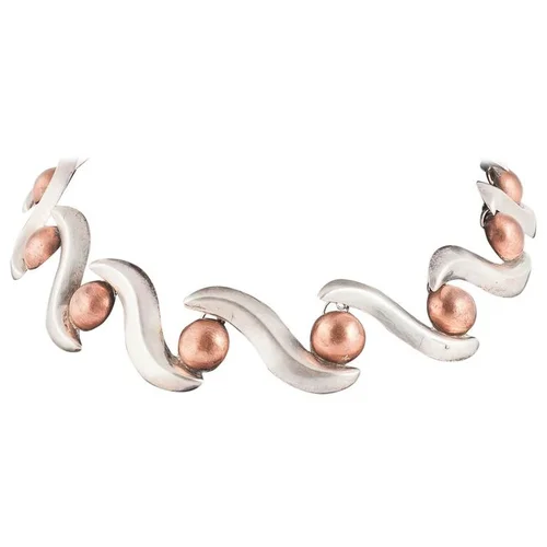 Simple and striking sterling silver and copper Mexican collar, 1950s.