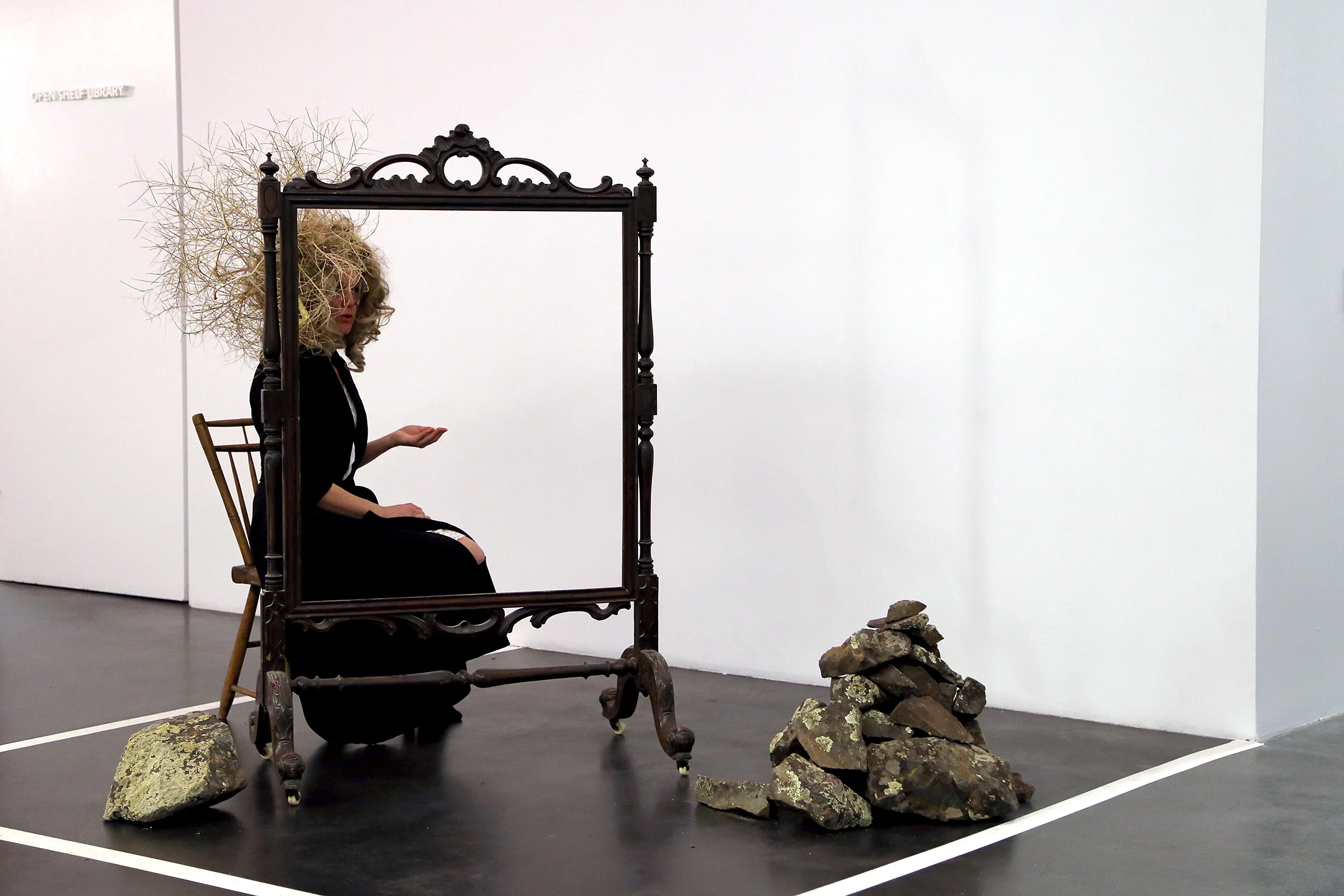   Language Lessons &nbsp;featured the seated character of Marie Antoinette, surrounded by landscape elements and an oversized portrait frame, attempting to repeat the French phrases from an instructional audio recording intended to teach English to n