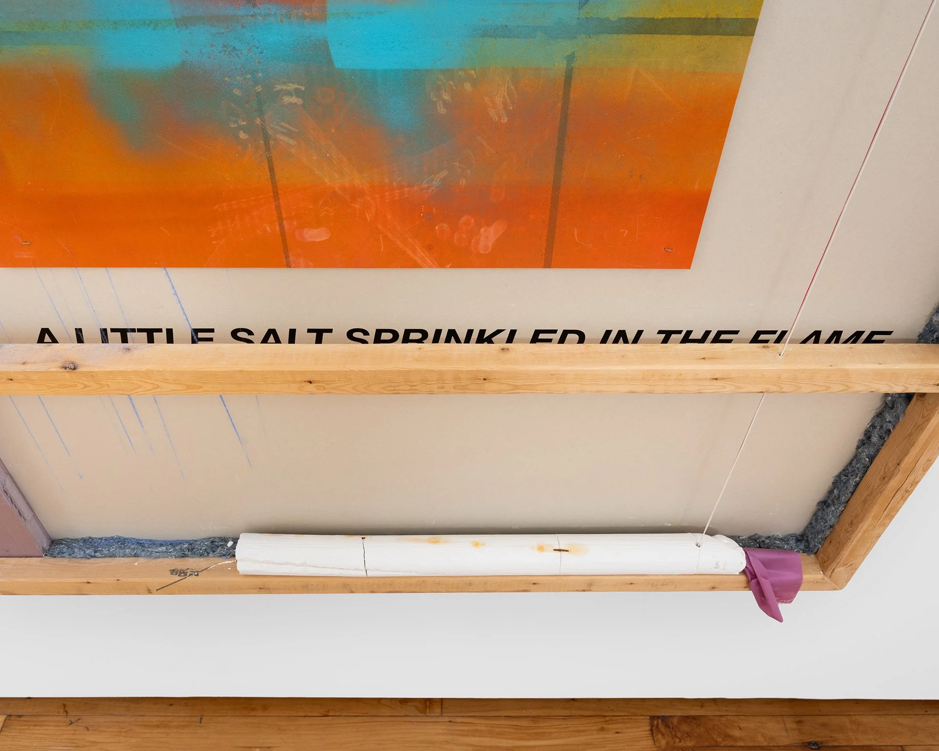    Bullseye  , 2024 (detail) drywall, dimensional lumber, rigid foam insulation, recycled denim, marking paint overspray on cardboard, plaster, locator flag, builder's chalk, vinyl lettering 54.5”h x 48”w x 4.5”d 