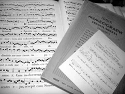 The antiphonarium with mimeograph stencil and a sample of sister’s work; a close up of her chant notation is below