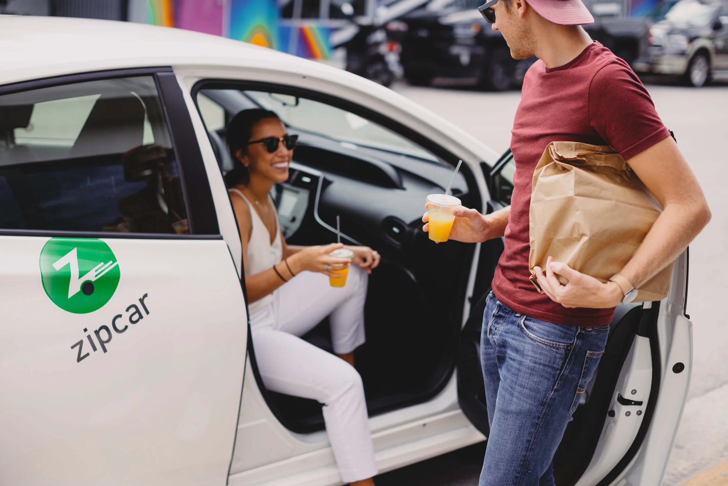 ZIPCAR-FLASHSTOCK-MIAMI_chatting_passenger_door.jpg