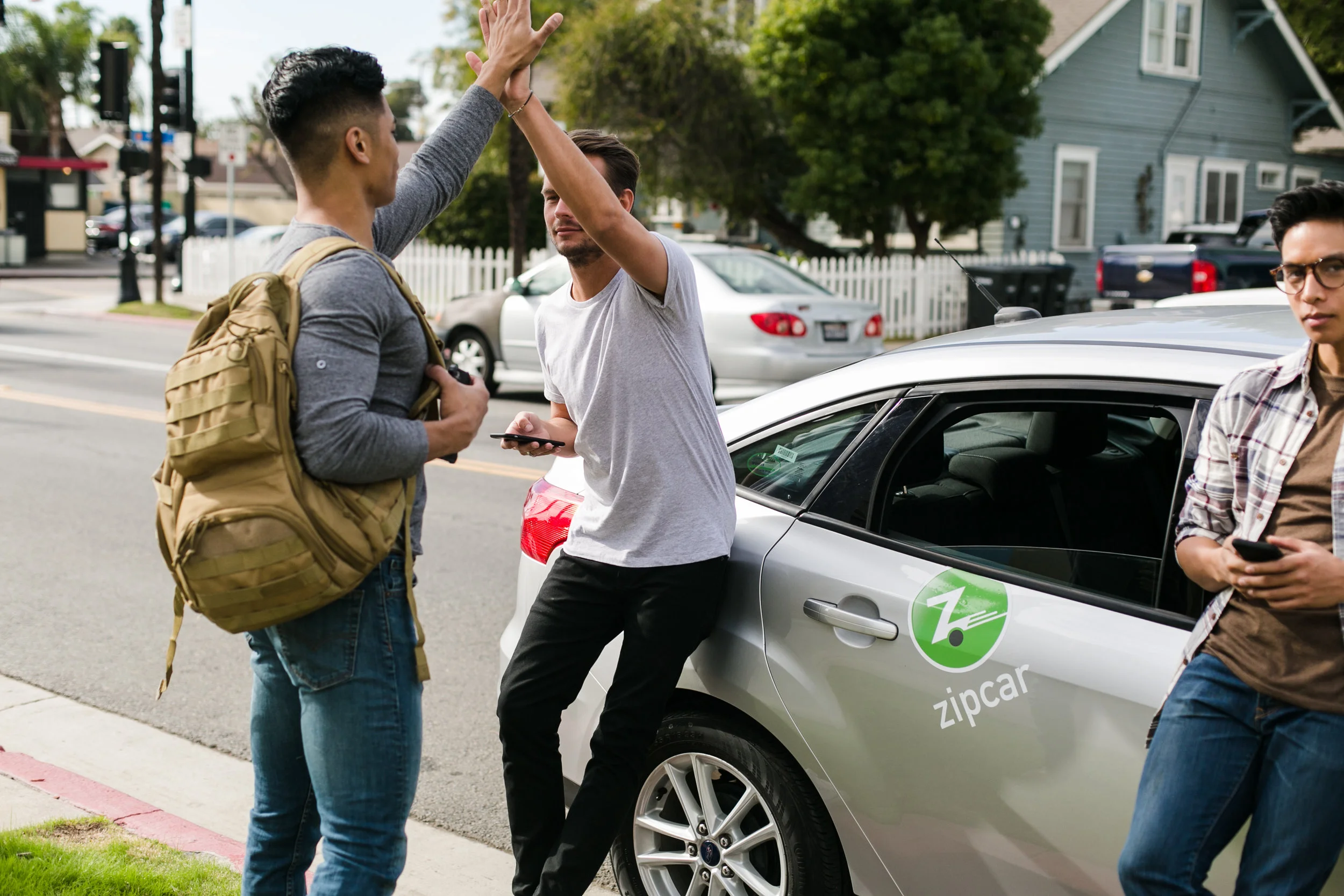 zipcar-flahstock-uni-high-five.jpg