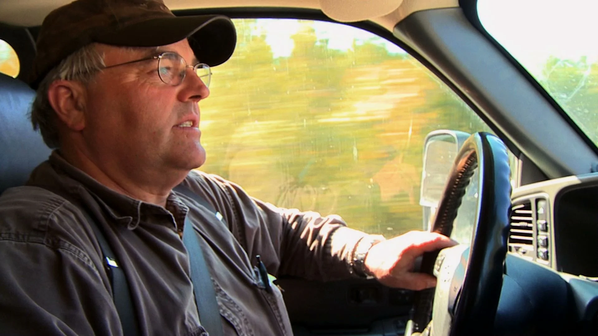 Winston driving to one of his many business concerns.
