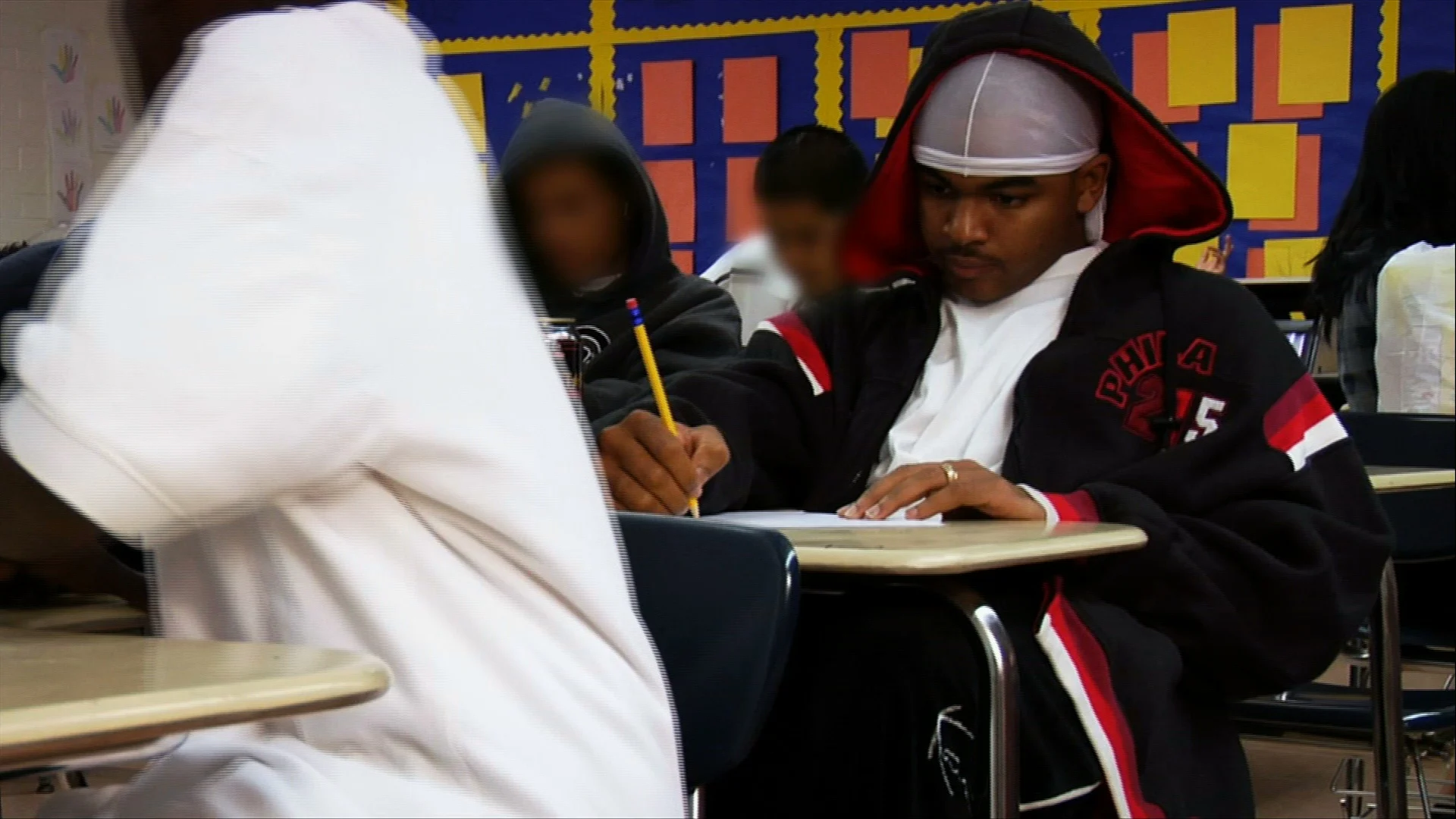 Deronte works in class at the SEA School.