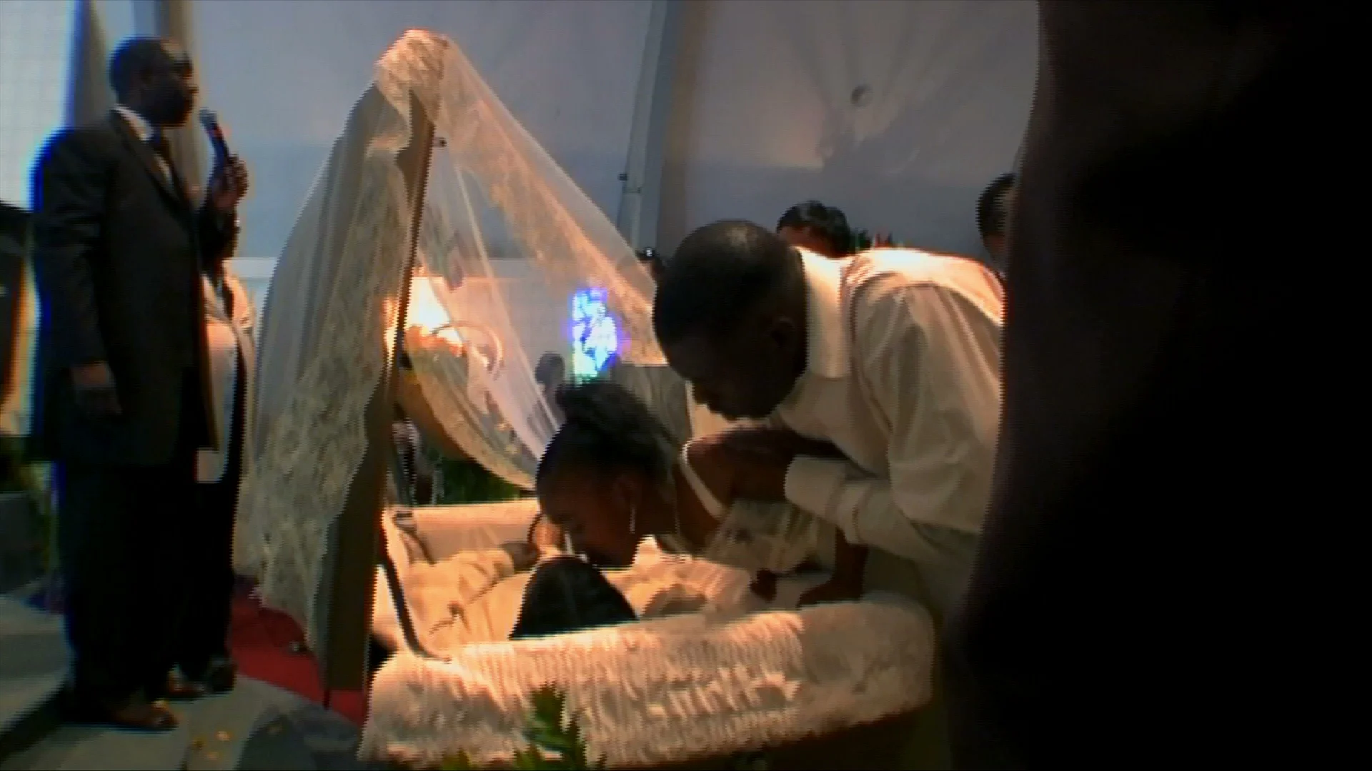 Brandon Bullard's young daughter kisses her father goodbye for the last time.