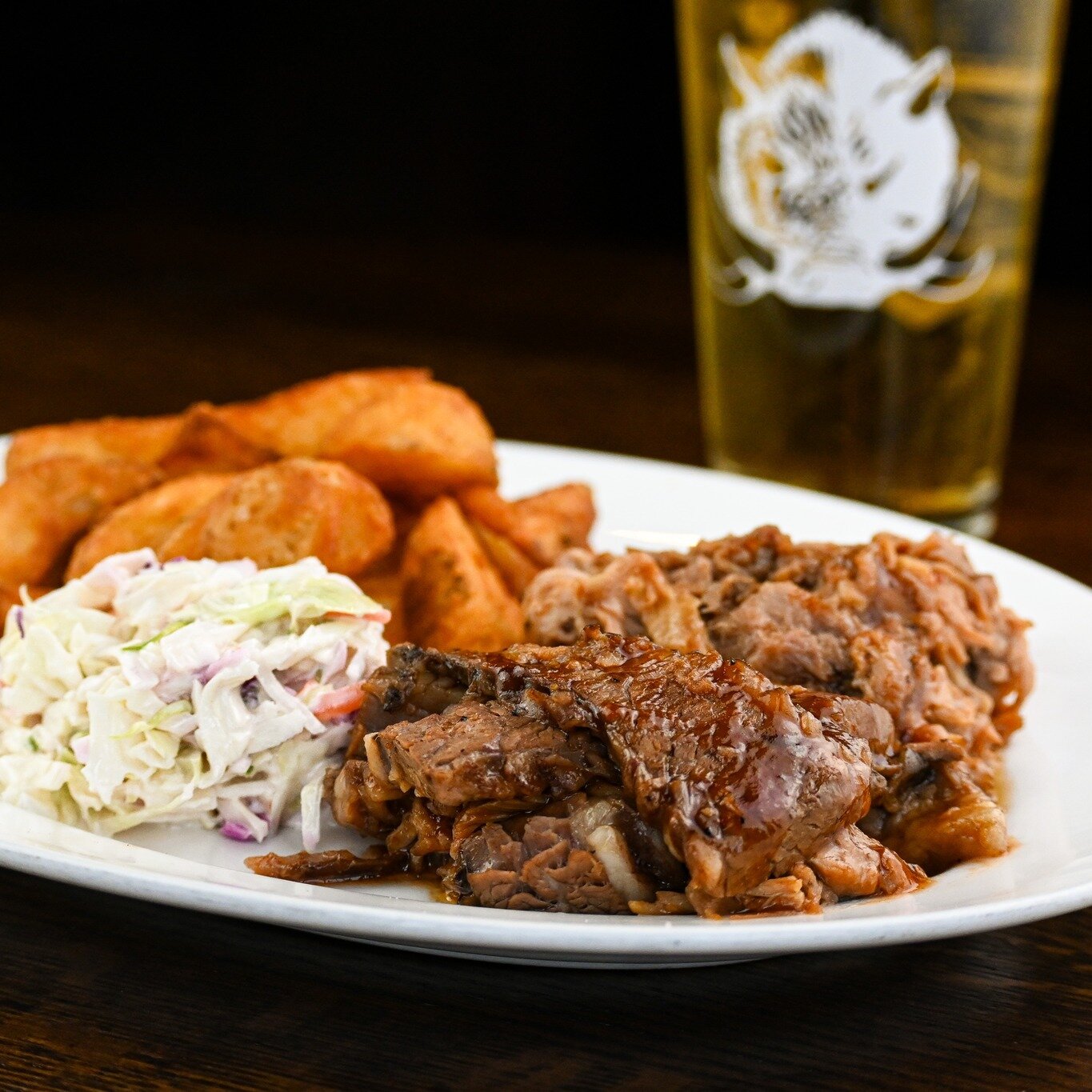 Our Tin City Platter features a delicious combination of pulled pork, smoked beef brisket, and all the fixings. Come and get your BBQ fix at Mad Boar today!

#madboarnc #wallacenc #exit385 #tastethemadness #BBQPerfection #BBQLovers