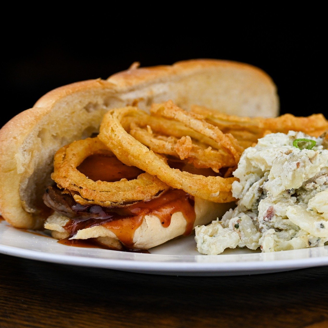 Our Brisket Sandwich at Mad Boar is a must-try. Juicy brisket, crispy onions, and smoky BBQ sauce &ndash; need we say more? 😍🔥

#madboarnc #wallacenc #exit385 #tastethemadness #BrisketSandwich #BBQGoodness #ComfortFood