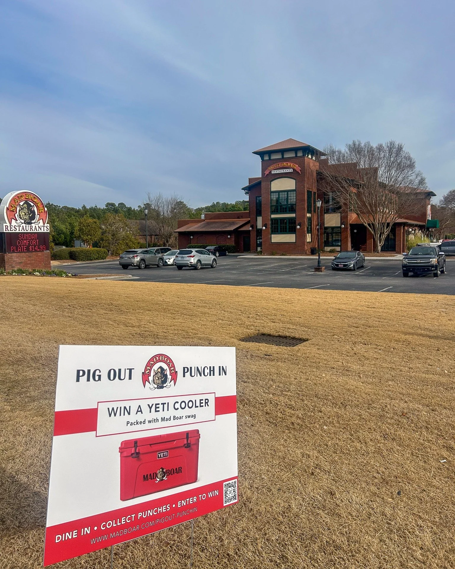 Swing by Mad Boar and Pig Out Punch In! From Jan 6&ndash;Feb 28, dine in, collect punches, and once your card is full, drop it in for a chance to win this Red YETI Cooler loaded with Mad Boar merch! The more cards you submit, the more chances to win.