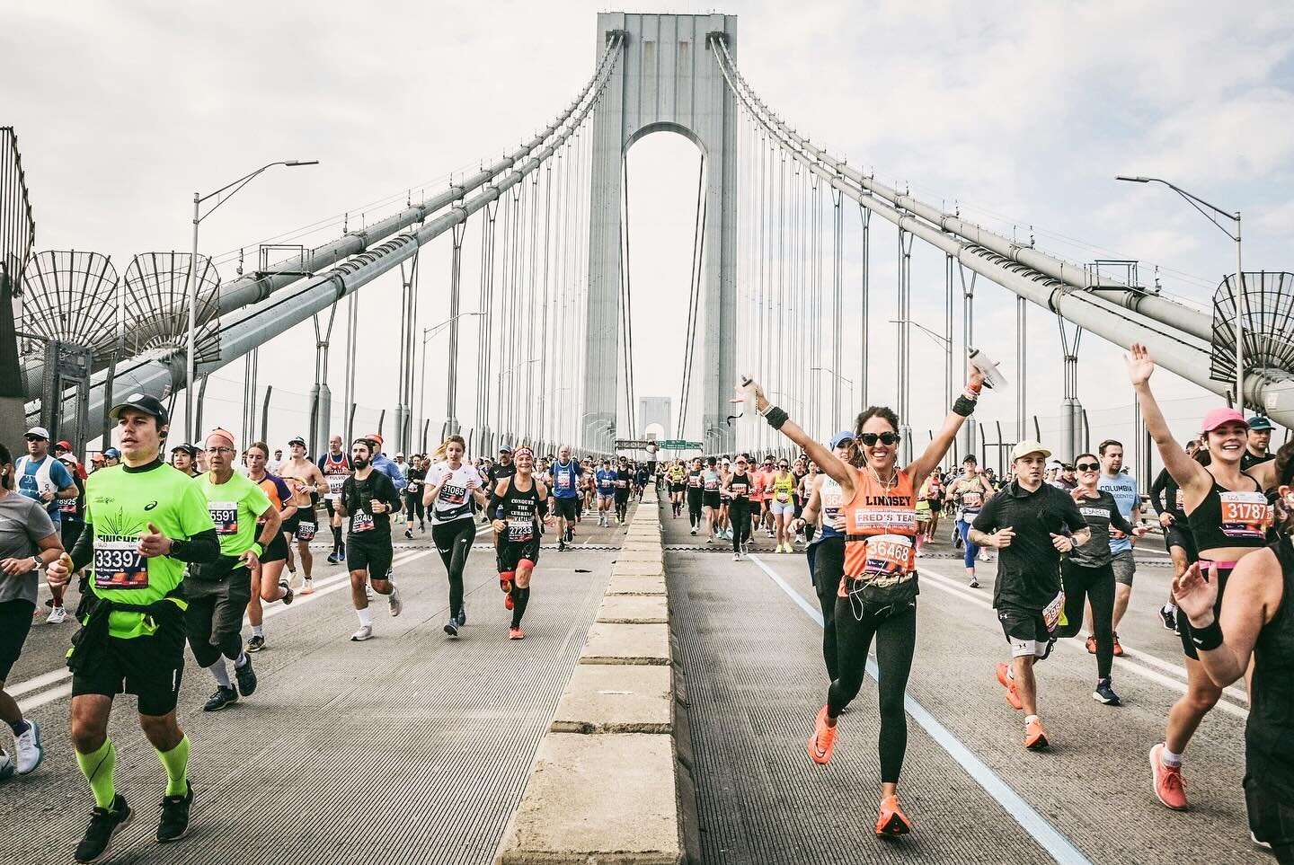 What a shot! So lucky to have that photographer on my path over the bridge!! 🍀 I can&rsquo;t even believe I ran this race!! So so so thankful!!!