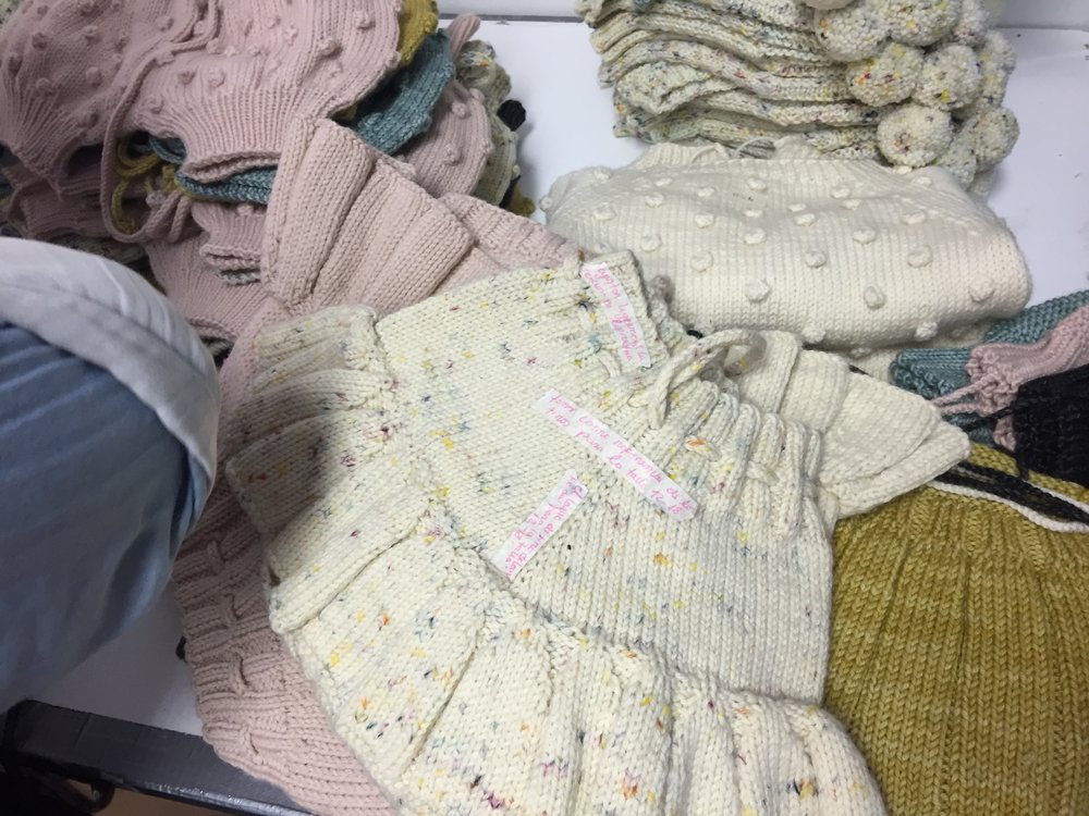Our knitters communicating specific questions on the garments. 