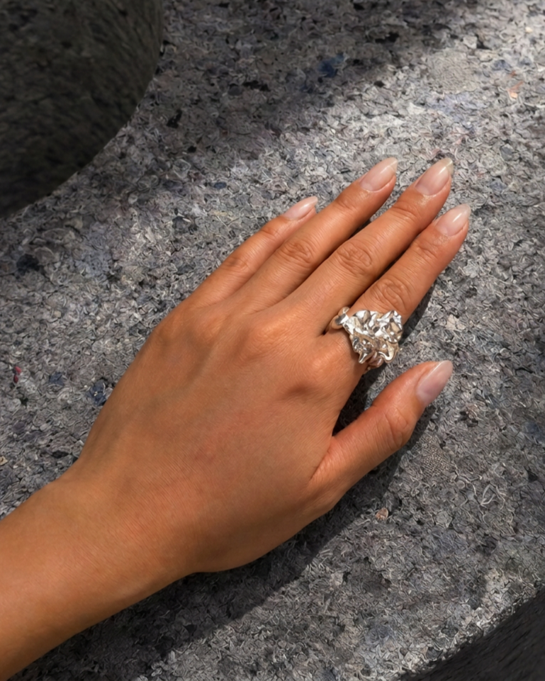jakhu-studio-moon-drops-ring-on-hand.png