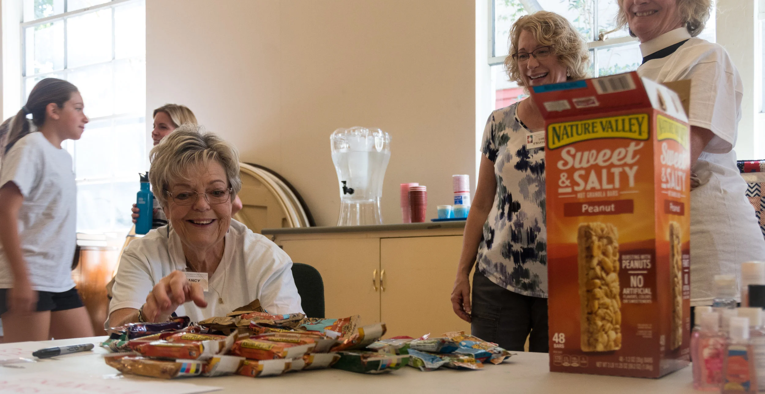 Sorting goods for the Defenders Lodge welcome bags