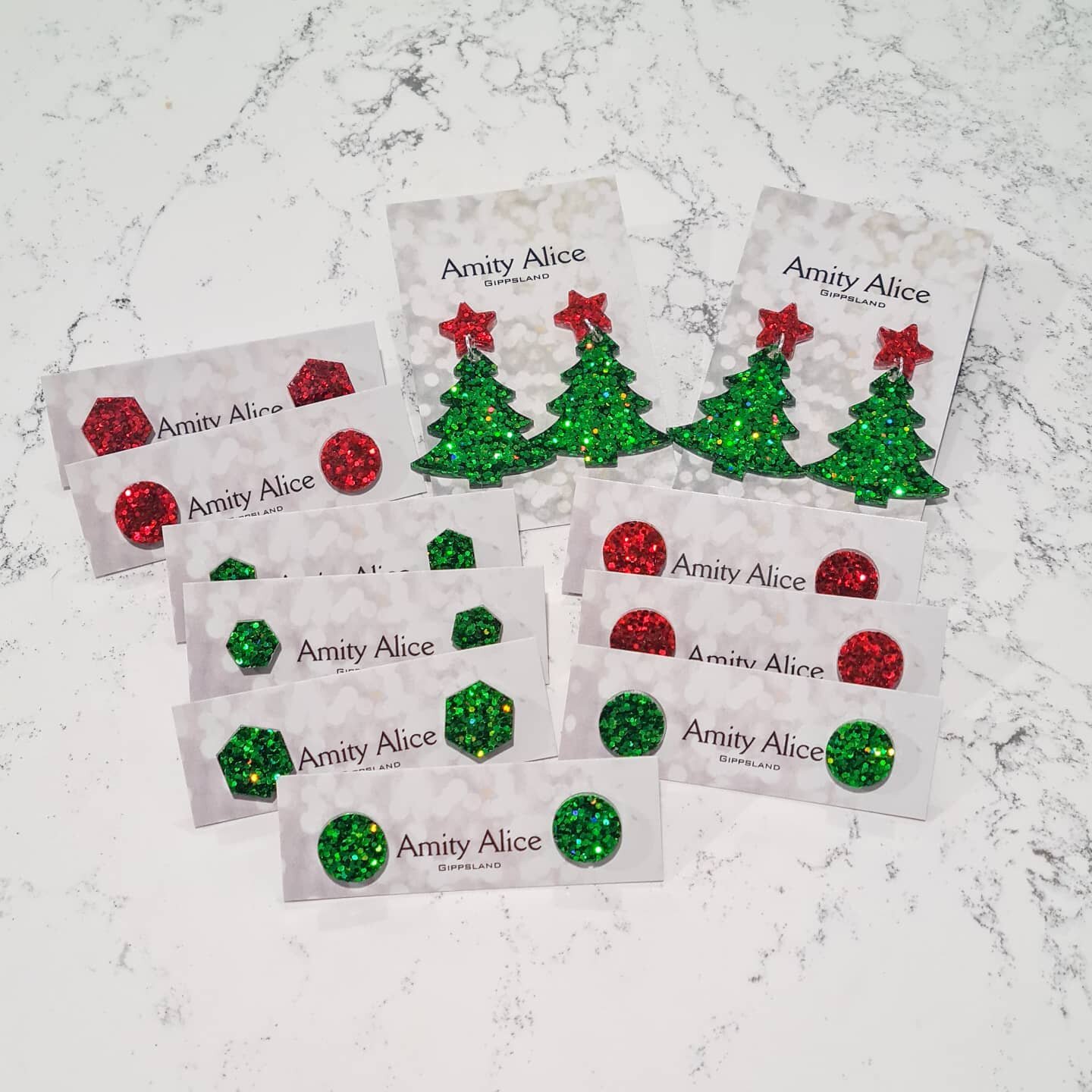 We have been inundated with sales and haven't had time to update the website with stock levels, but we have one pair of the Christmas trees and a few sets of the Christmas studs available - the perfect teachers and stocking presents - head in store a