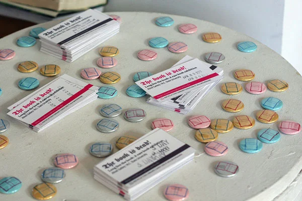  I worked with Courtney Johnson to design information cards for the exhibition. We designed them to look like old school library cards. Sarah Blackmon designed the book pins.&nbsp; 