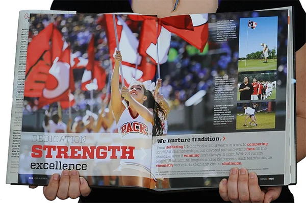  A spread from the book's opener, focusing on athletics. Luis Zapata's photo of the cheerleader at an away football game, is one of my favorites from the book, as it captured the power of school spirit at our school. The copy, which I wrote, focused 