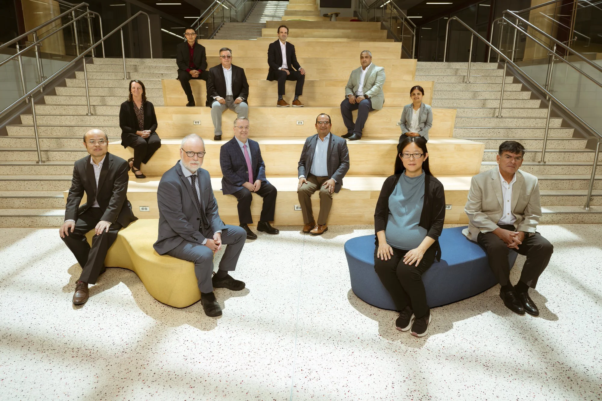 Corporate group portrait of Texas A&amp;M Engineering Professors seated on tiered steps 