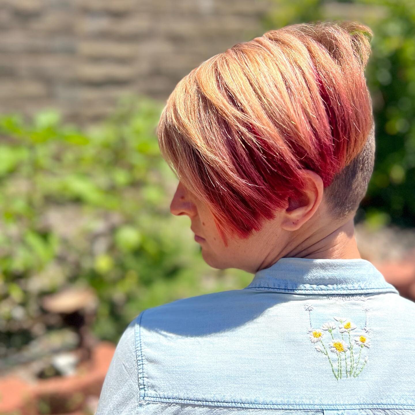 I will always try to look for the little bit of beauty and goodness in the world. 

Even if it means creating it myself, and embroidering little chamomile flowers onto my clothes.

[Image Description: Lauren, a queer white non binary person with shor
