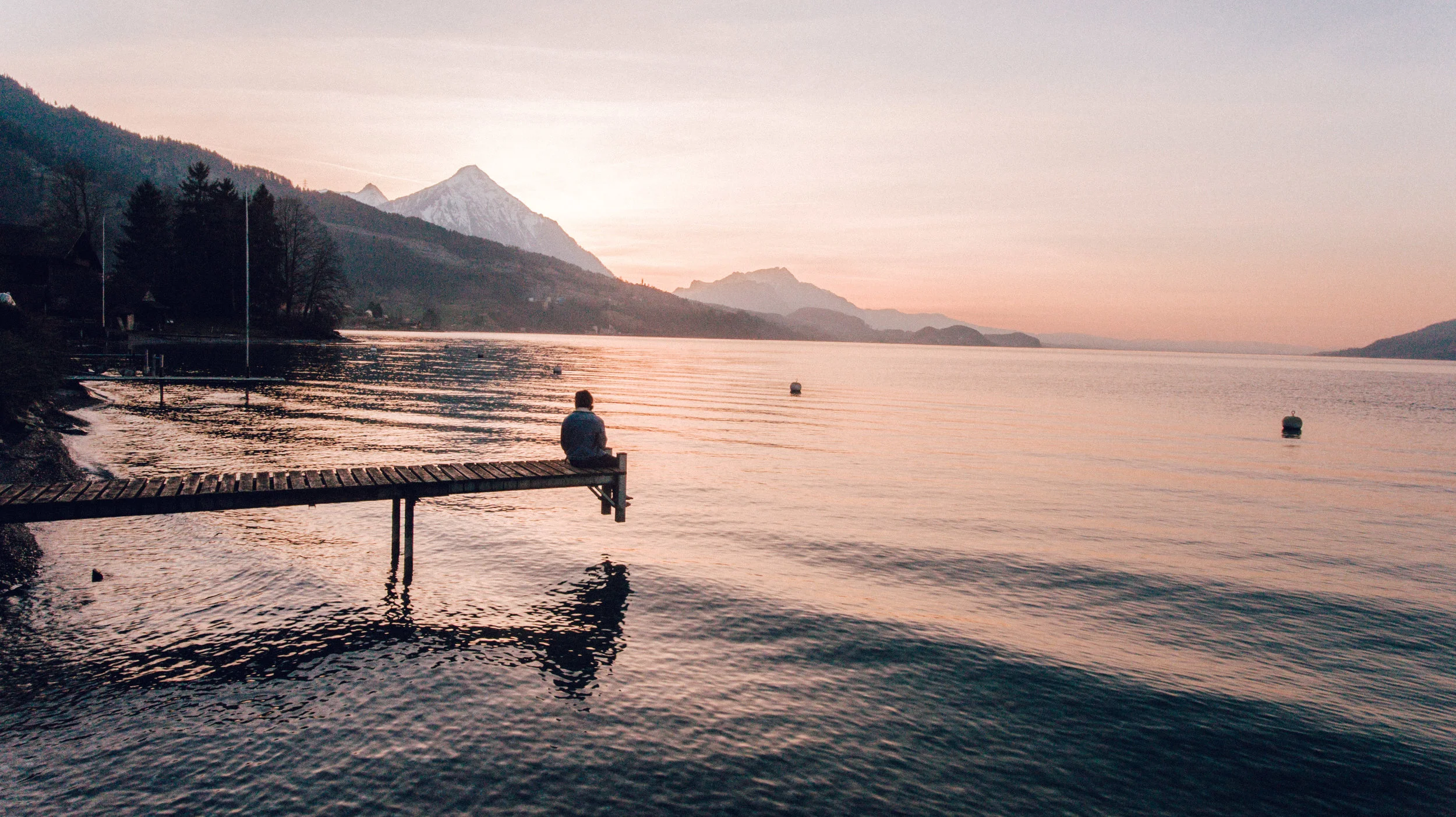 Drone shot of a Swiss lake/mountains