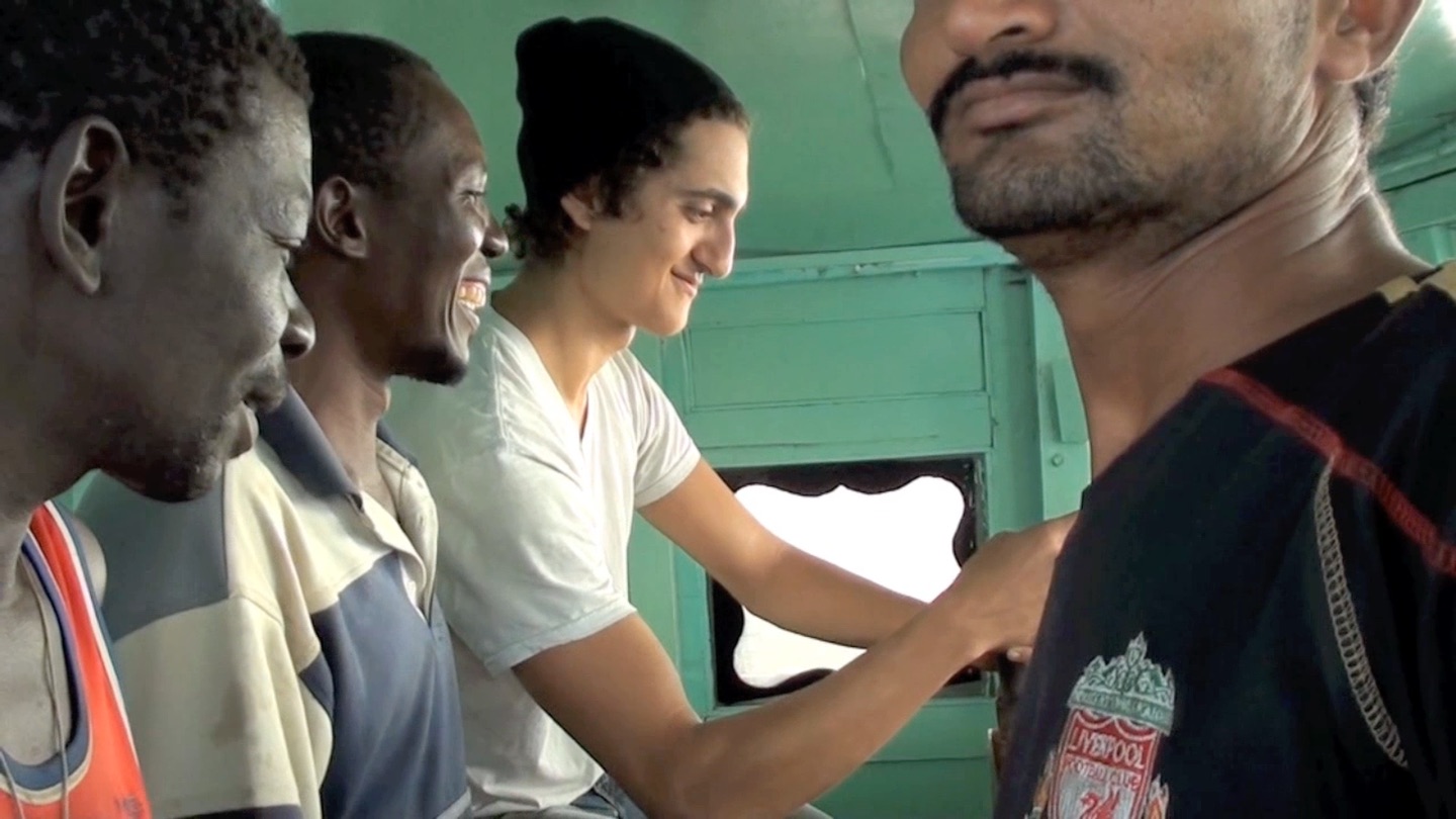 Scene from Yemen-Somalia boat crossing . Most dangerous moment: here, where Adam is let captain. 