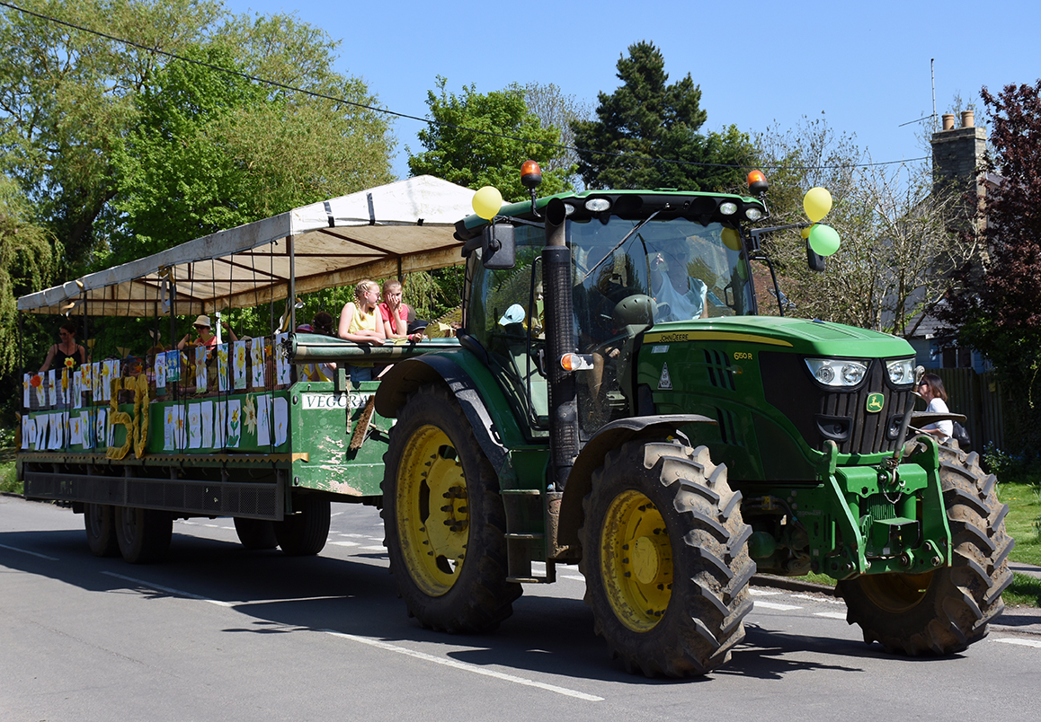 The School float was adorned with brightly coloured daffodils