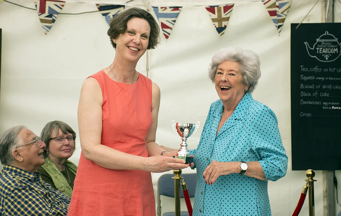 Victoria Penty receiving the Jeremy Murray Community Award on behalf of Thriplow Primary School