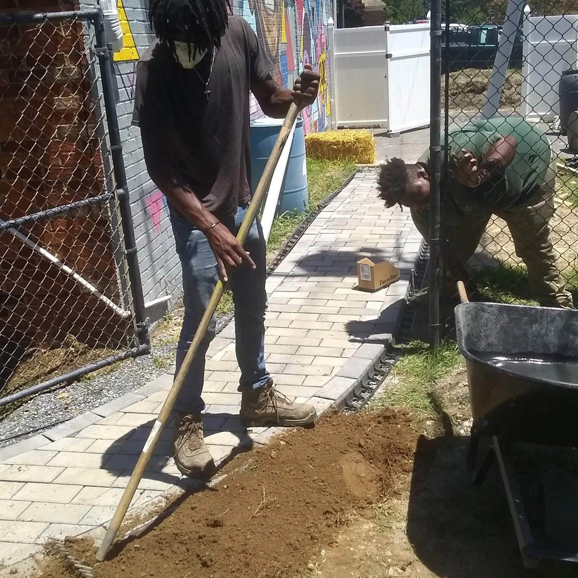 Green Workforce, practicing social distancing - is still out in the community, creating green infrastructure and keeping things moving.