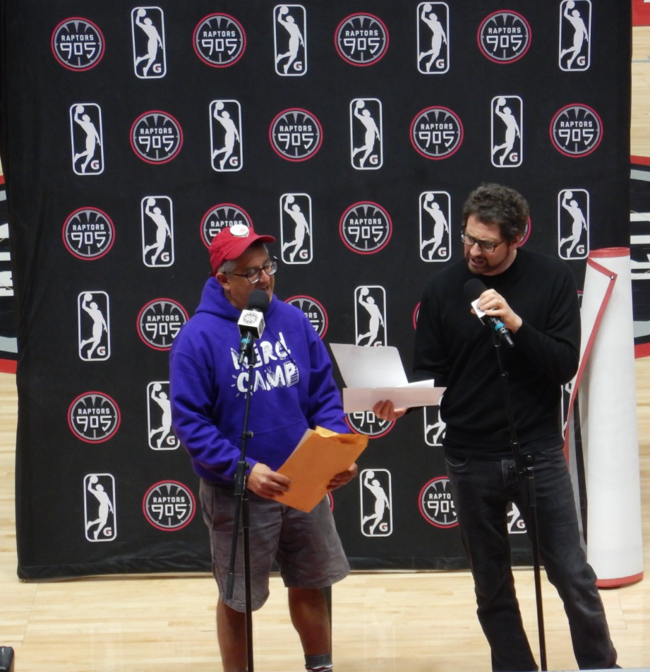 I am also shorter than my friend Kenneth Oppel. This is announcing the winning school from the Raptors905 challenge.