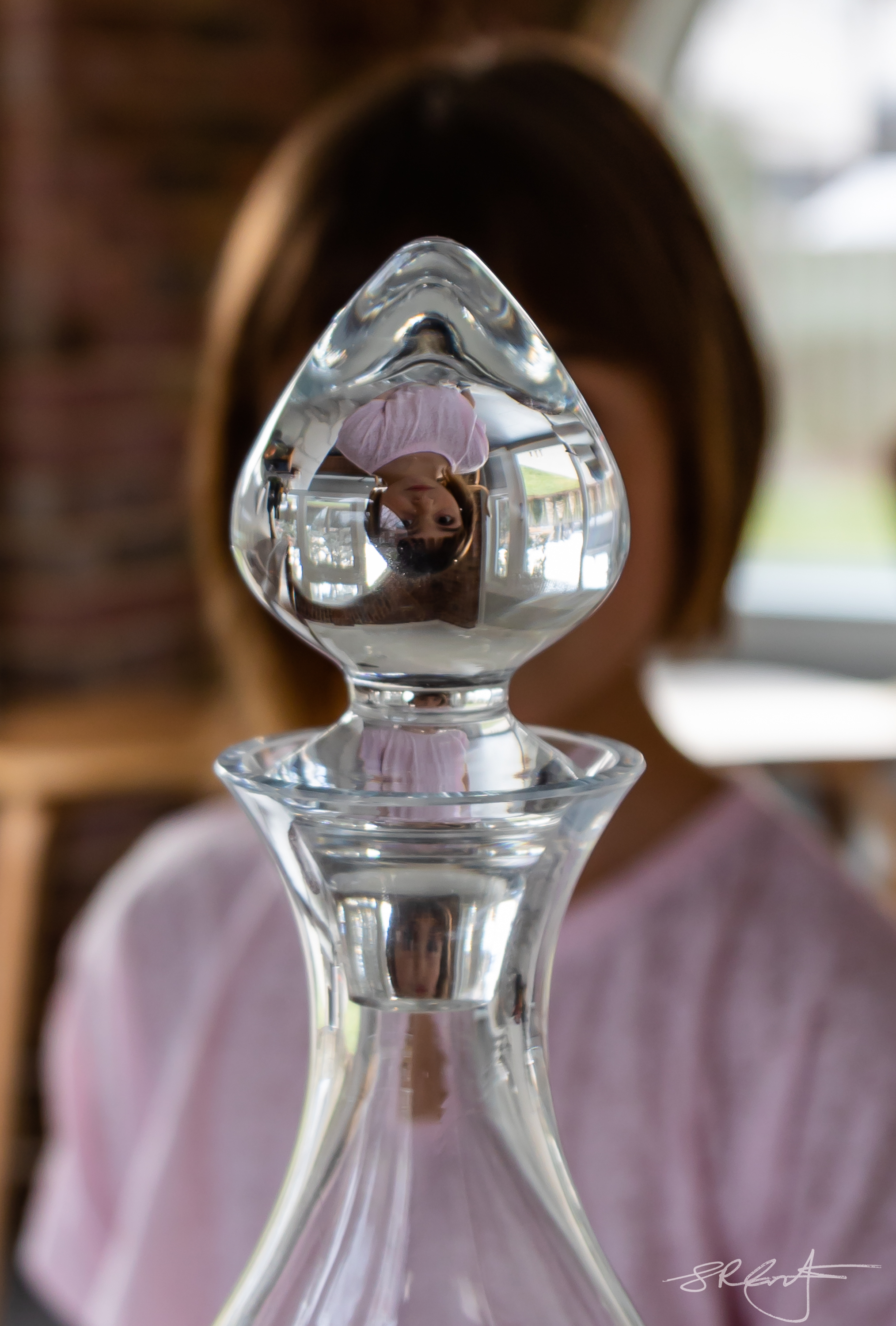 Reflection in a wine decanter