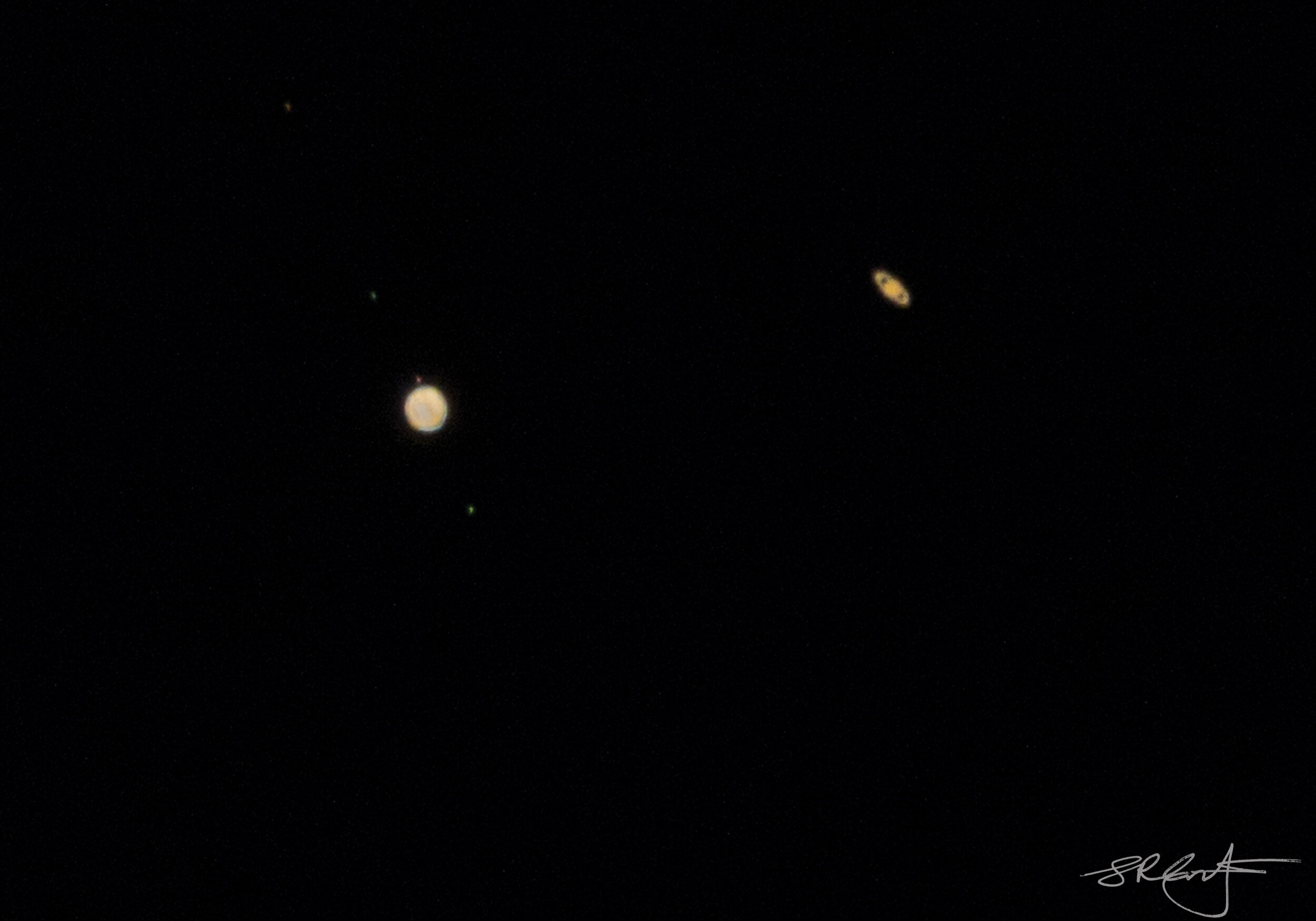 The Convergence of Jupiter with Four Moons and Saturn above