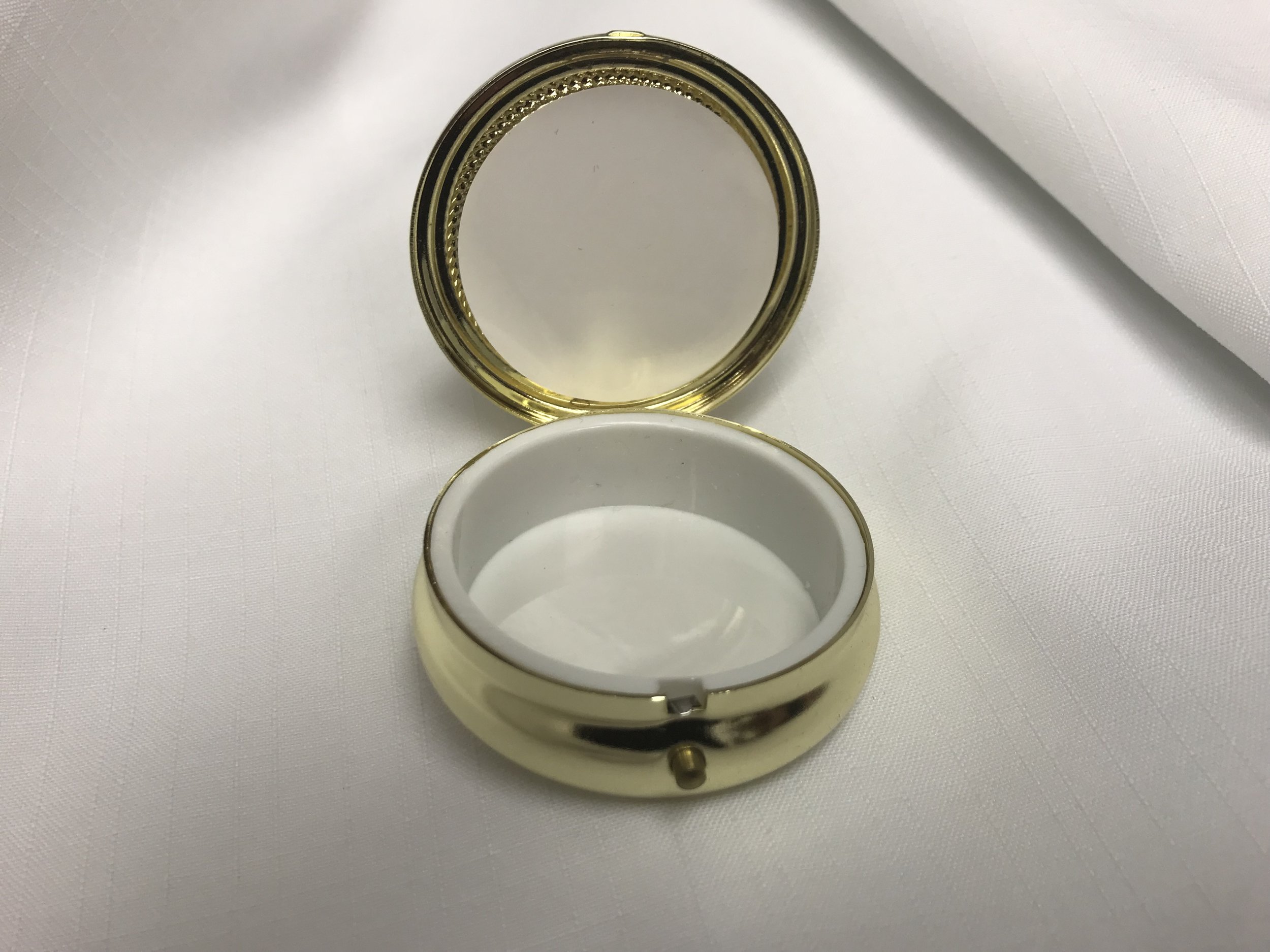 Pyx that holds the Eucharist