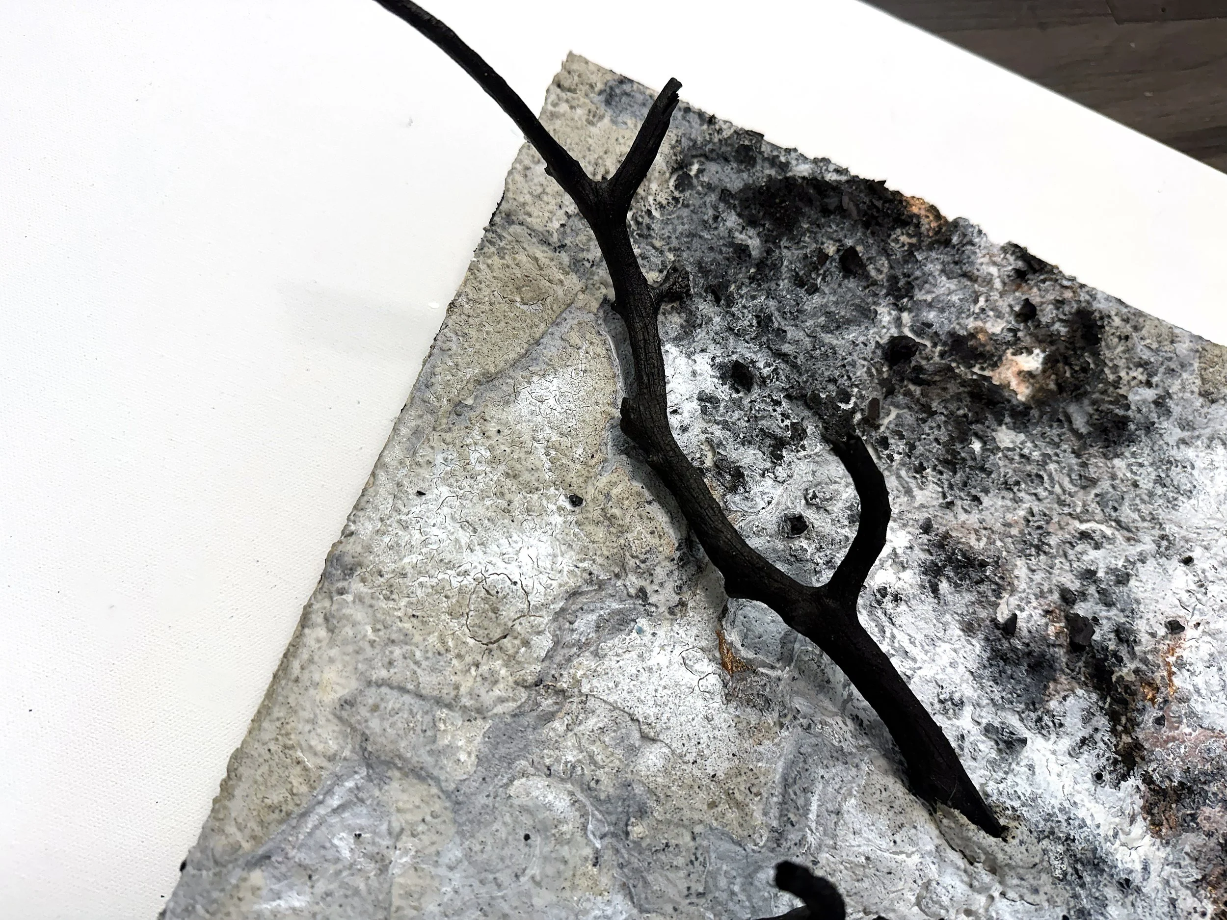 KatherineFilice_CommonGround_No5_Ink_Stucco_Charcoal_FoundObjectsonWoodPanel_17-5x14x7_2025_Detail2.jpg
