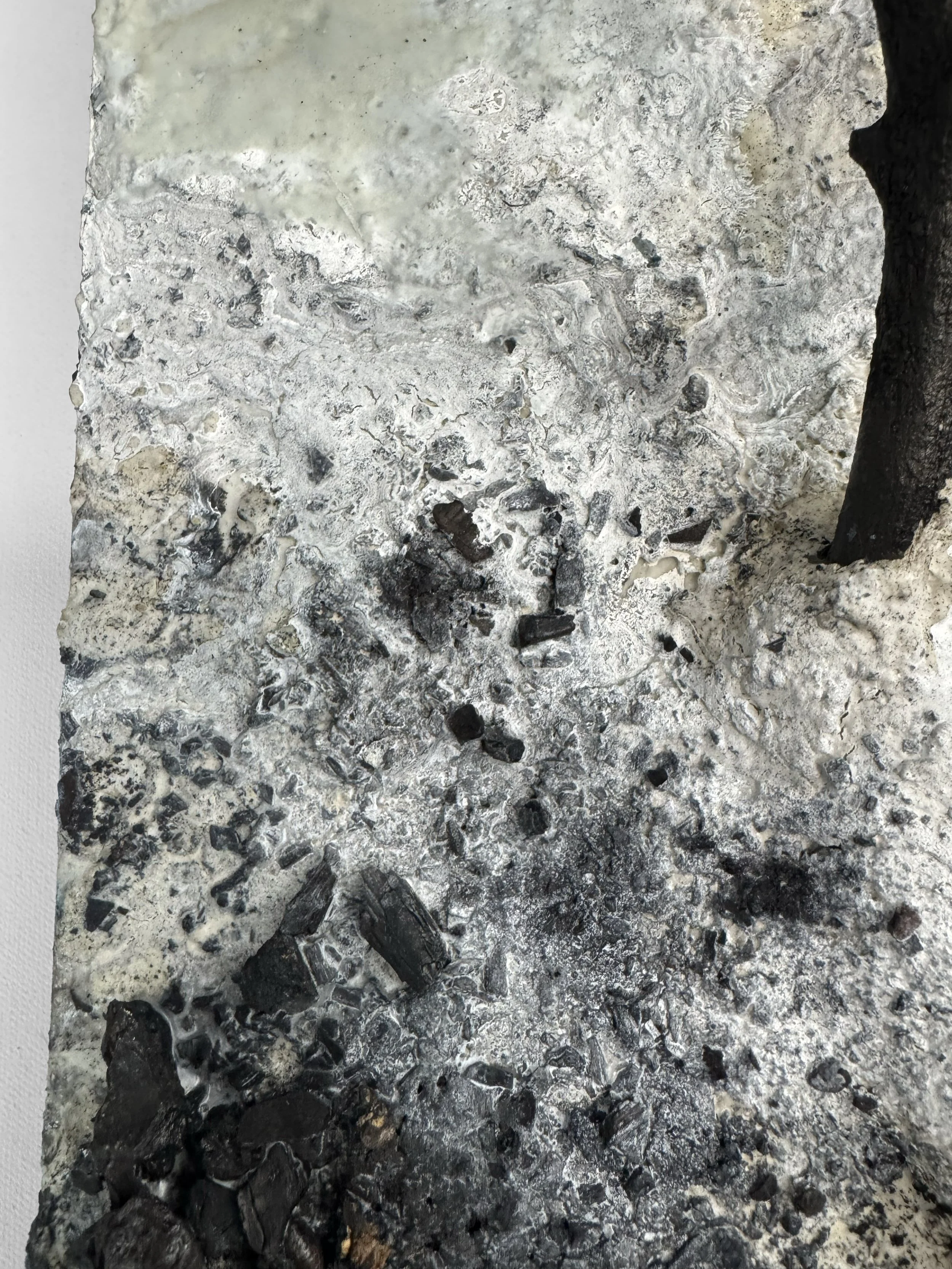 KatherineFilice_CommonGround_No5_Ink_Stucco_Charcoal_FoundObjectsonWoodPanel_17-5x14x7_2025_Detail5.jpg