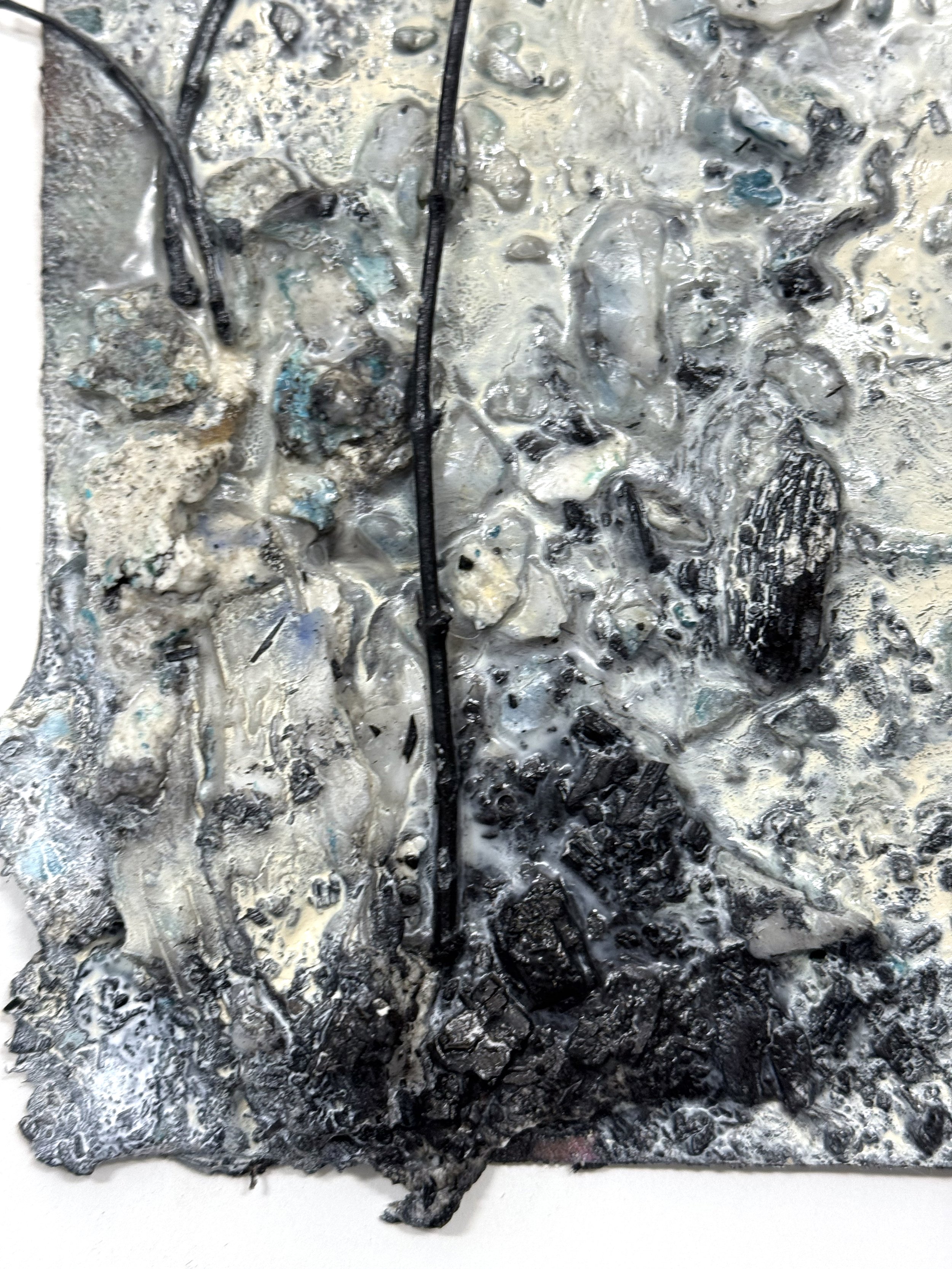 KatherineFilice_BurnScar_No3_Inkpaperwaxdrippingspaperstuccobranchesandcharcoalonburiedcanvas_11x11_2025_detail1.jpg