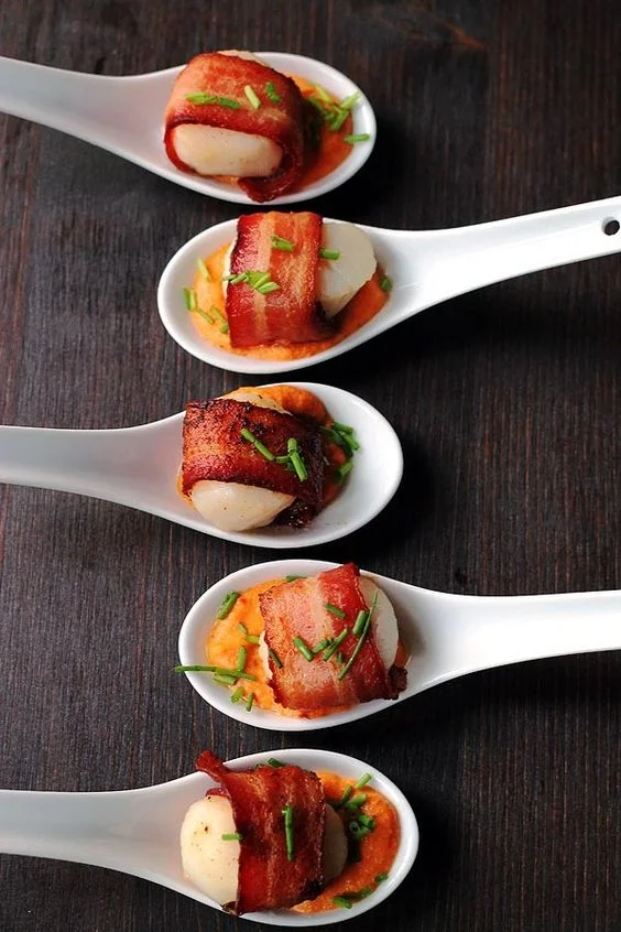 Bacon wrapped scallops with cajun cream sauce