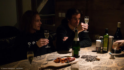 drinking champagne with the boys. celebrating the coming powder days