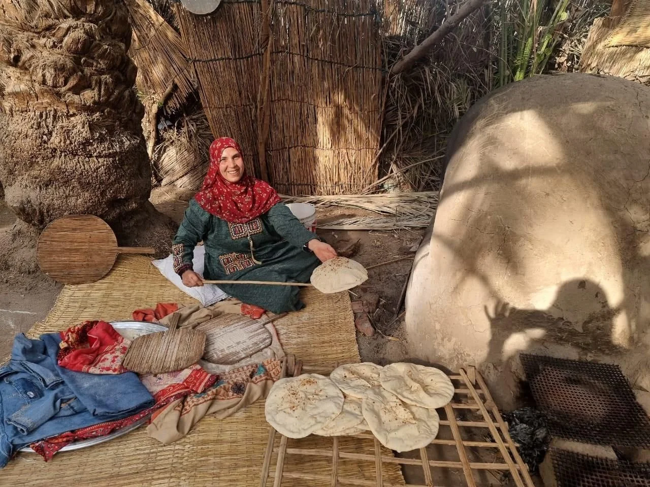 Woman making bread in Nubian Village