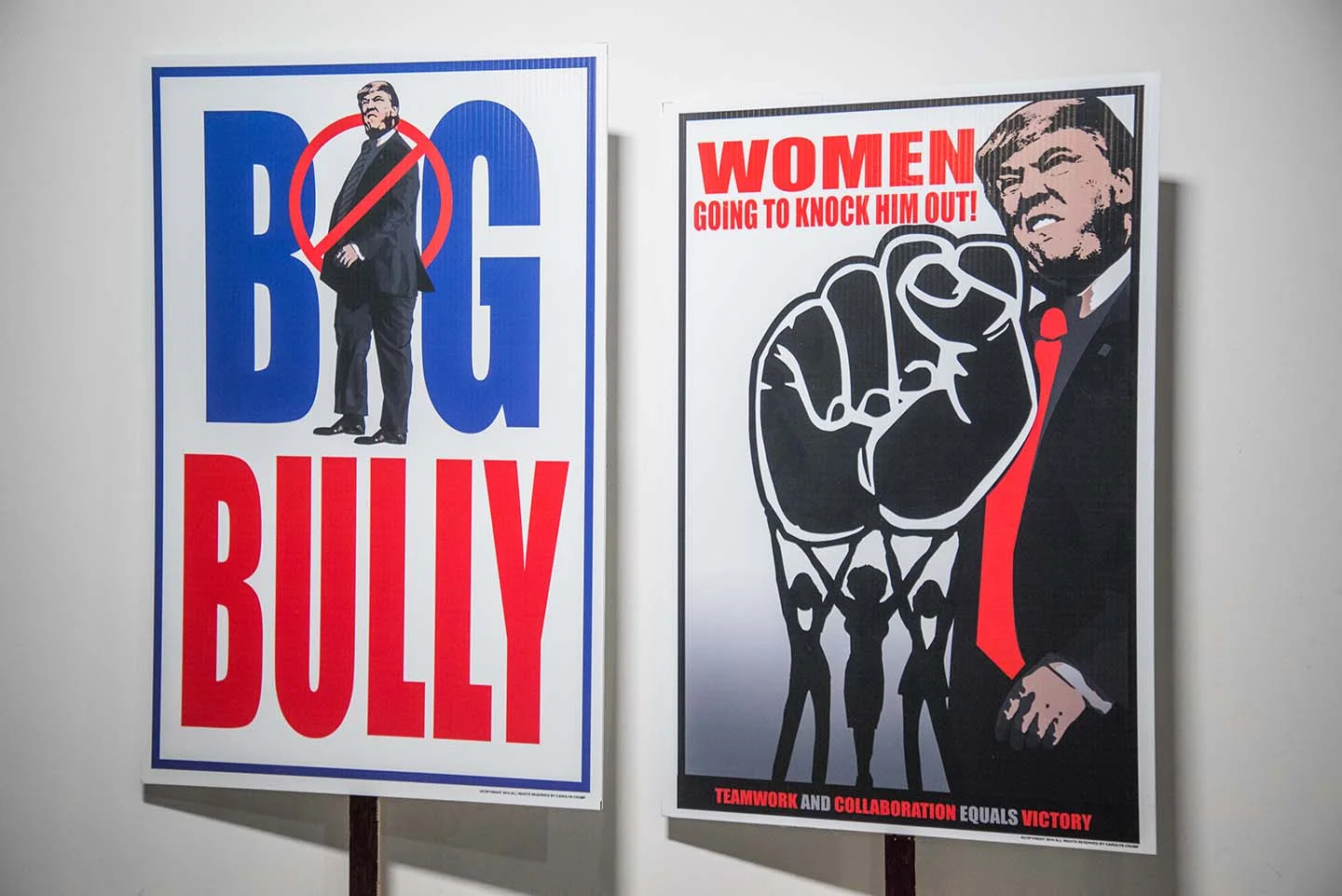 Both works: Carolyn Crump (Houston, TX), printed on corrugated vinyl, 18"x27.25" each 