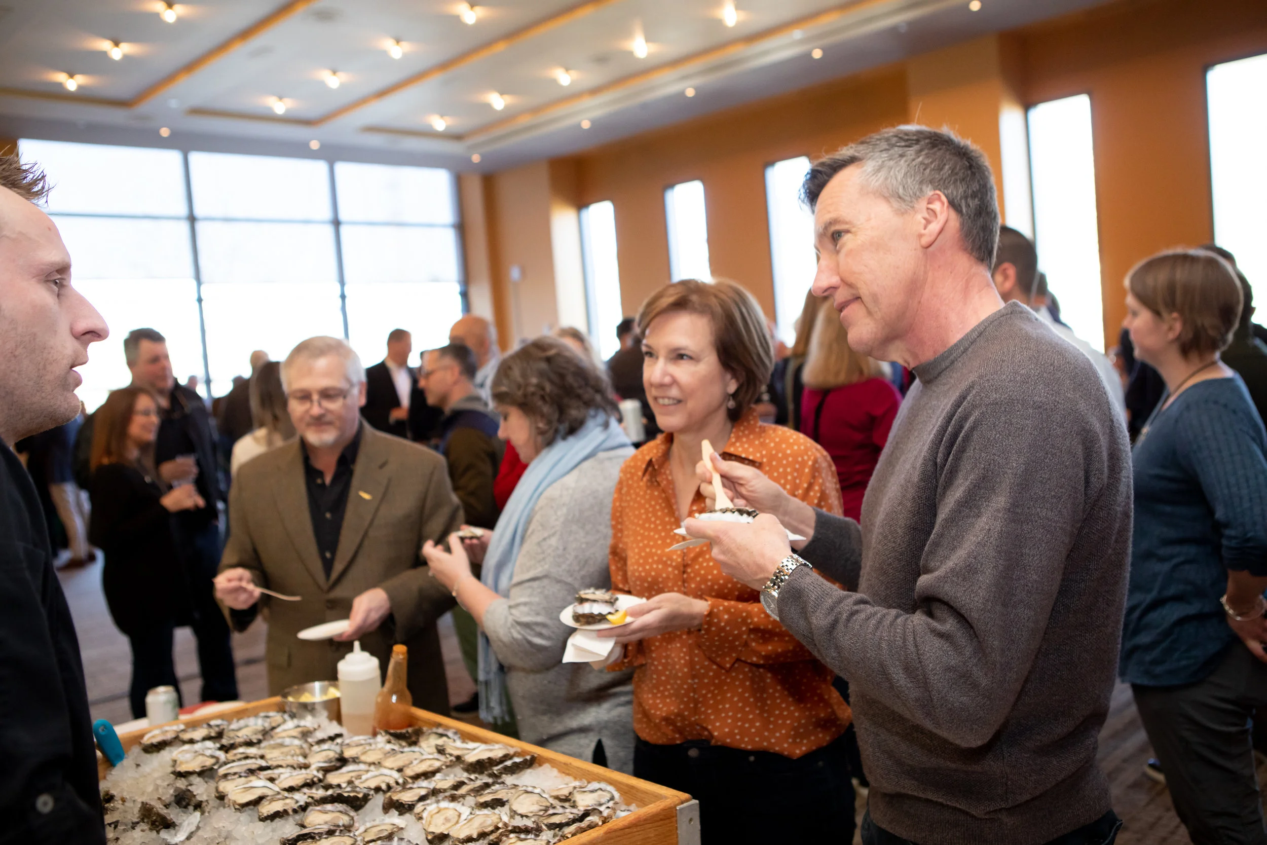 Chatting up the guys from Taylor Shellfish // Photo by Megan Swann Photography
