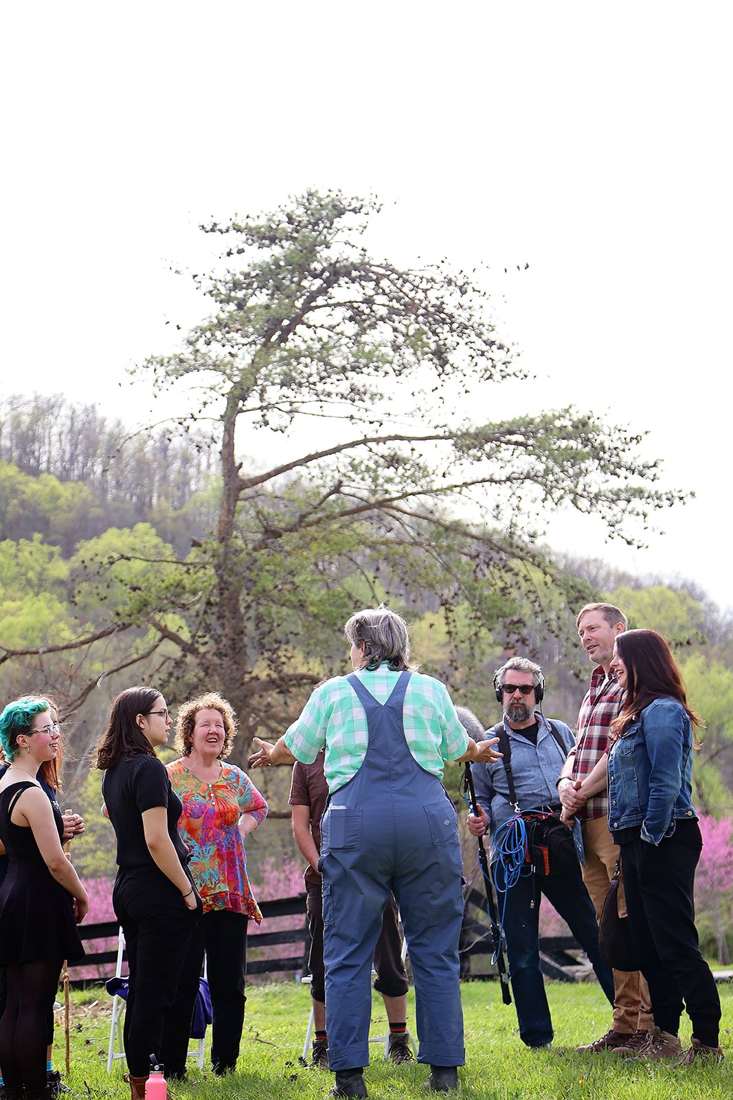  Nicole Garneau performs as guide for Ezell: Ballad of a Land Man, March 2022, Berea College Forestry Center. Photo: Erica Chambers.  